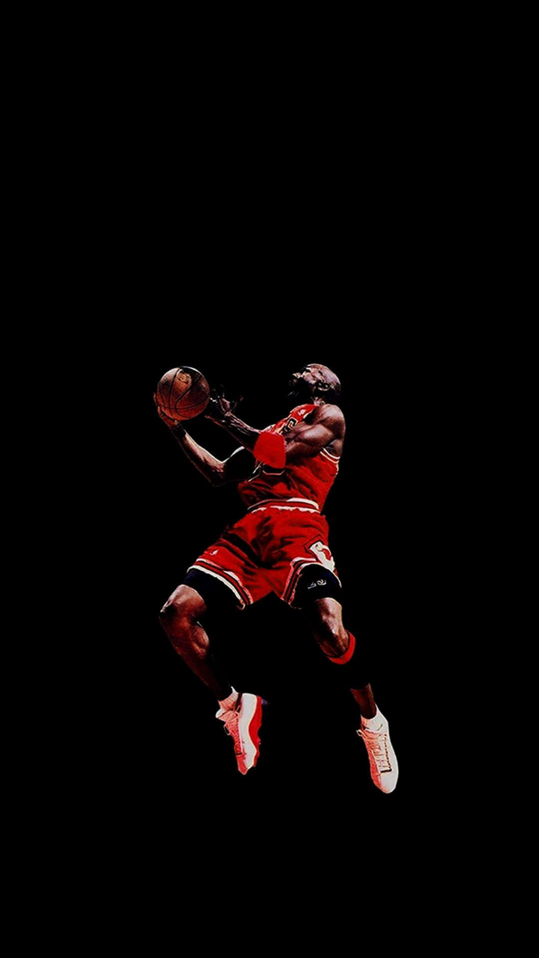 Download A Basketball Player Is Jumping
