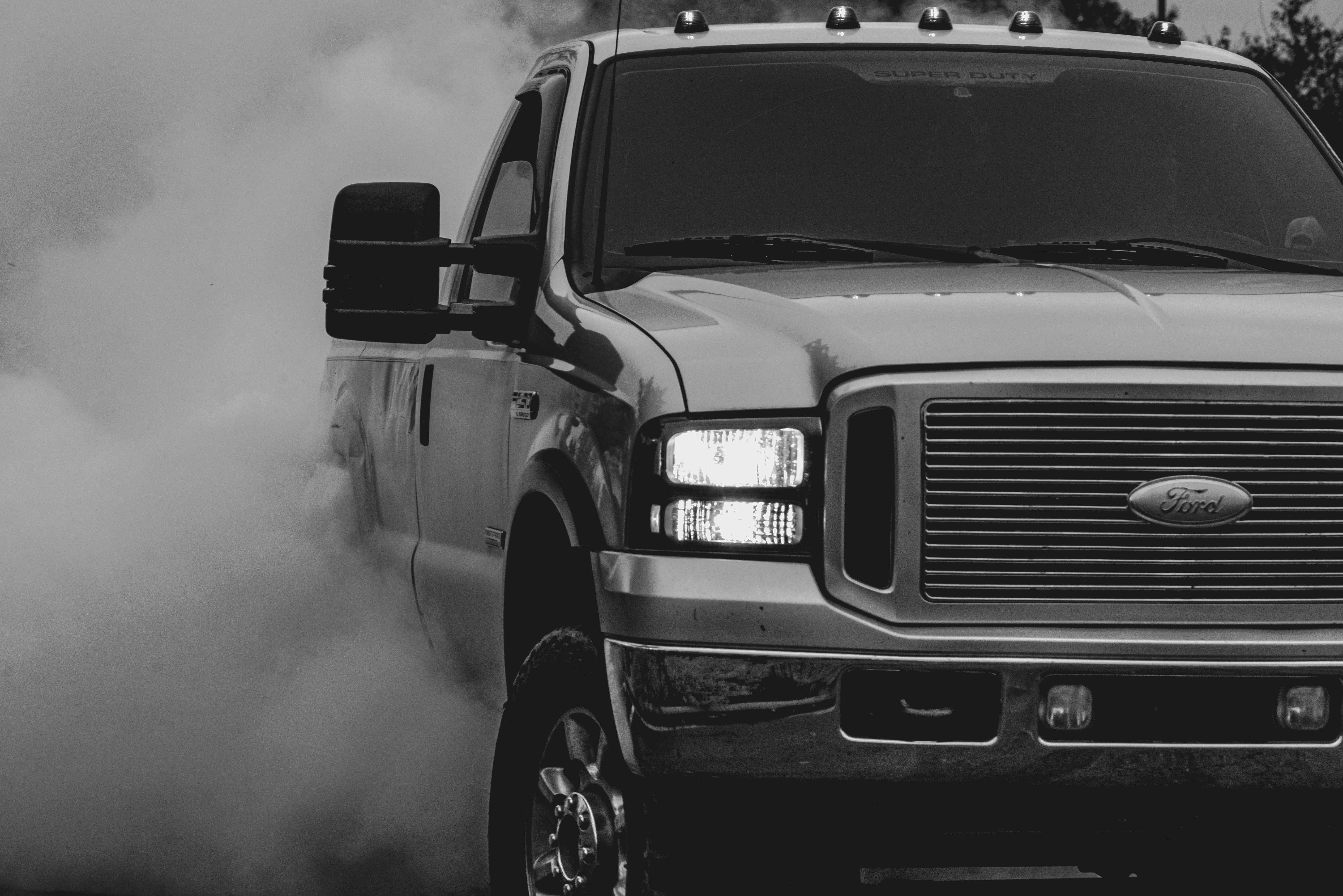 Grayscale Photo of Ford Pickup Truck