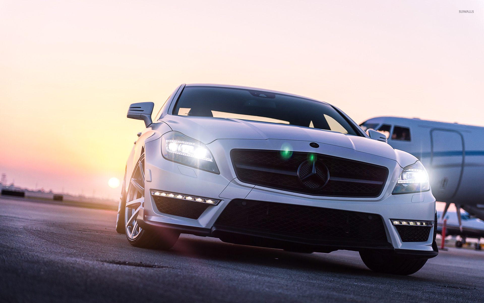 White Mercedes Benz CLS Class At Sunset