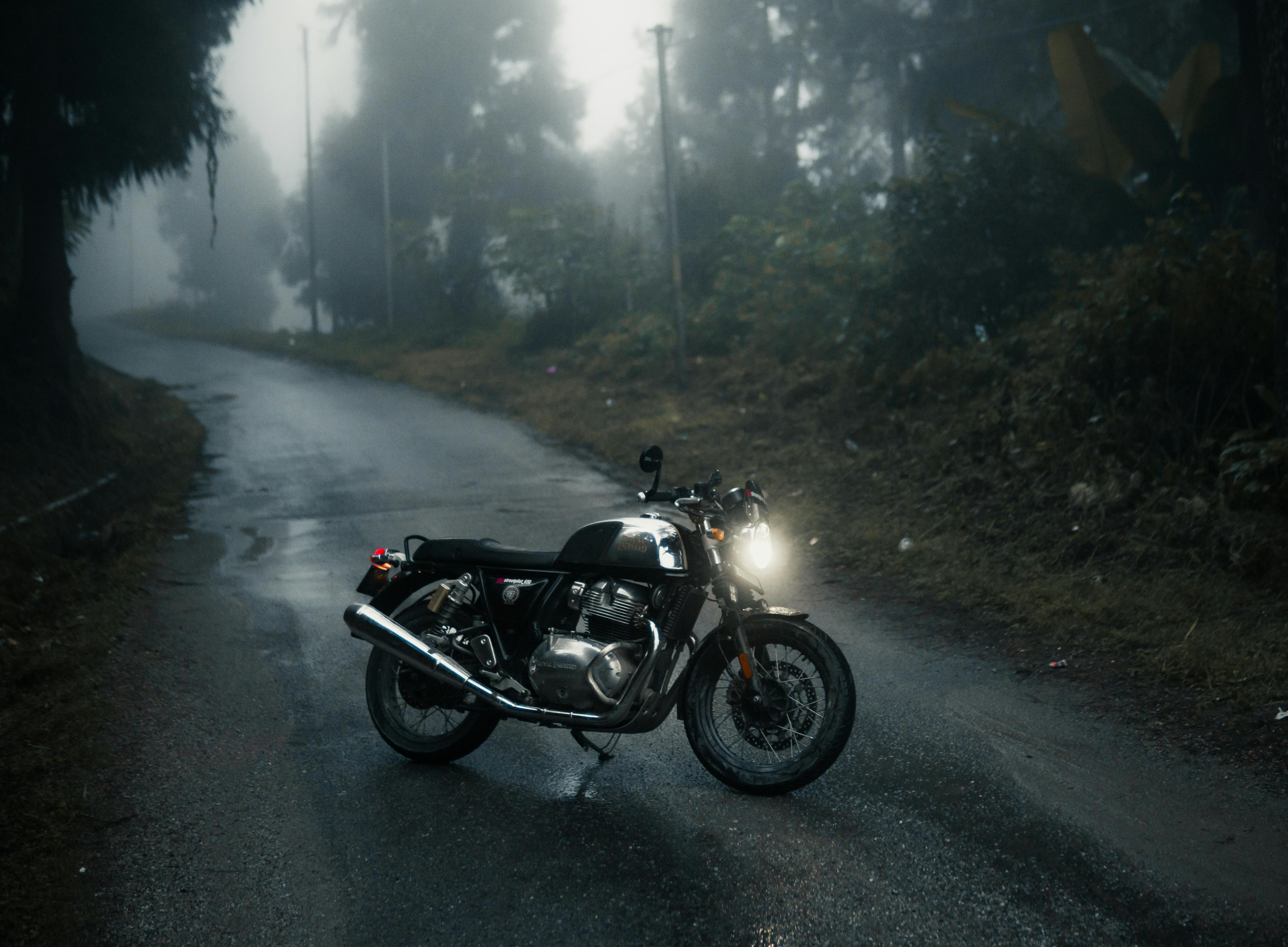 Royal Enfield Continental GT 650 Motorcycle on the Road on a Foggy Morning · Free