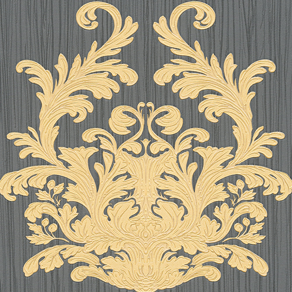 gold emblem with filigree embossed pattern