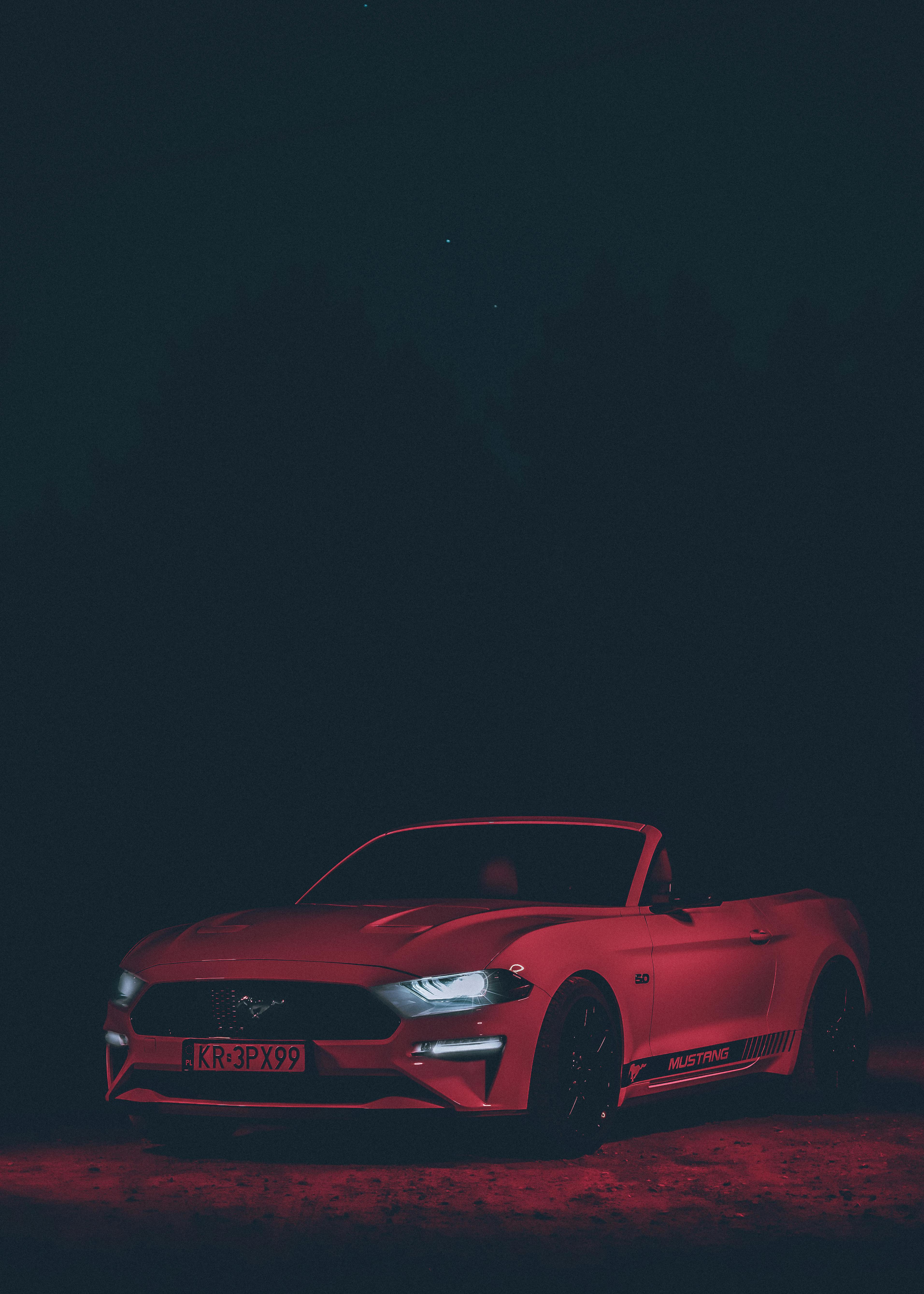 Low Light Photography of Red Mustang