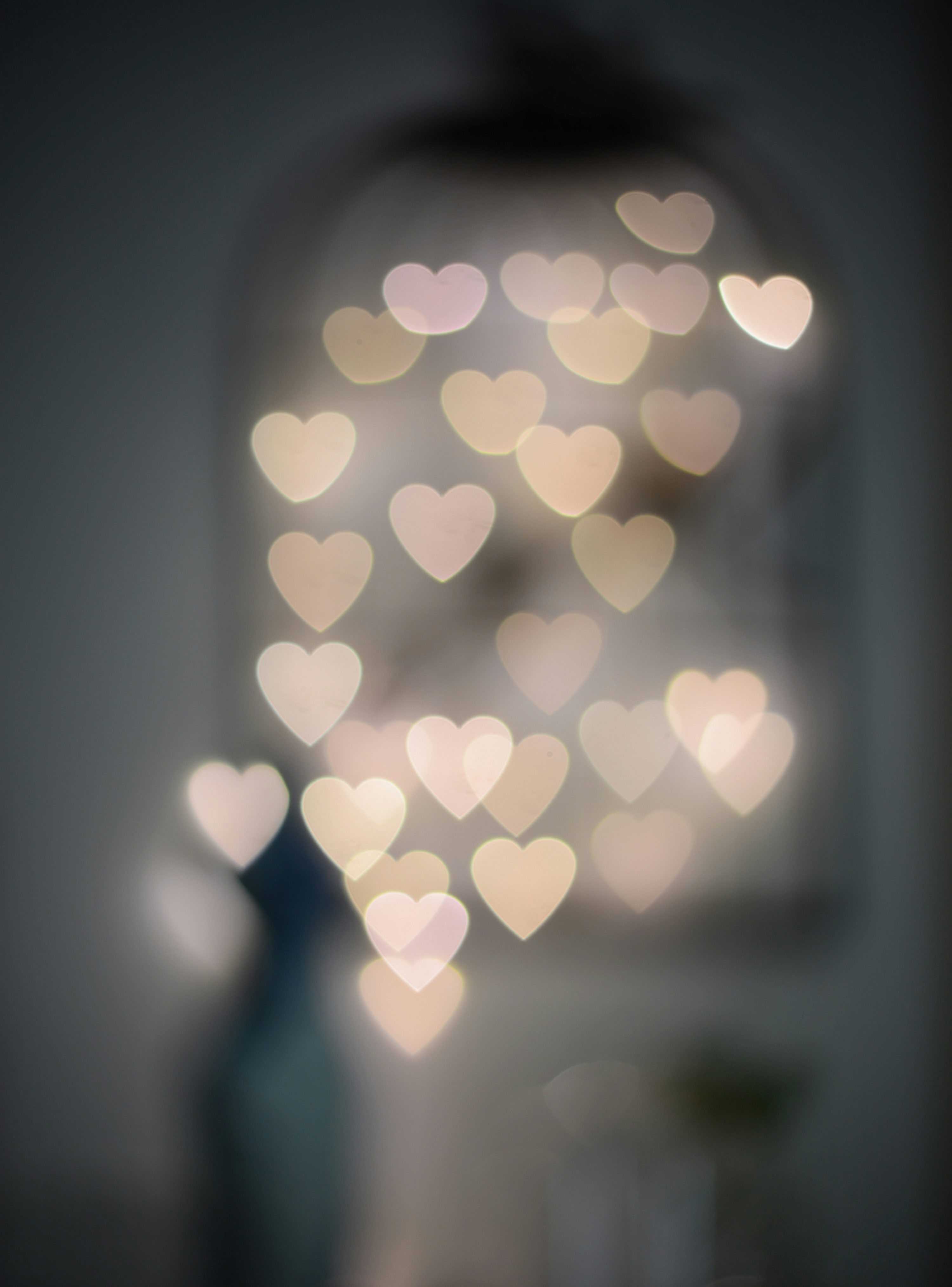 Multiple blurry heart shaped lights
