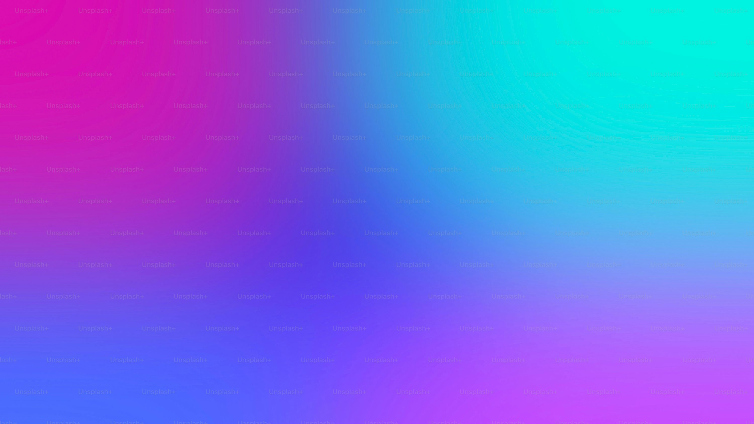 A blurry image of a blue and pink