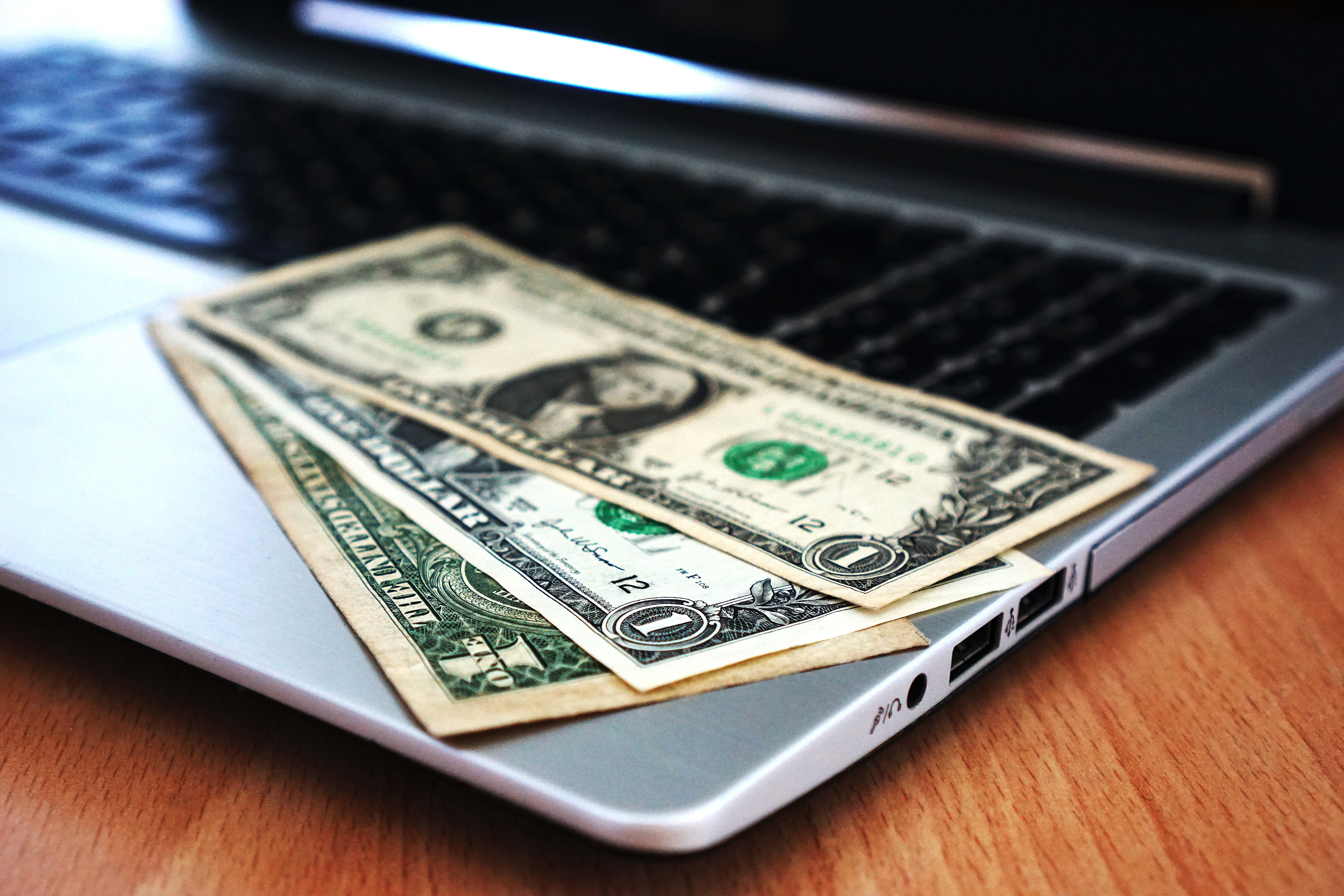 Dollar Bill on Macbook Pro