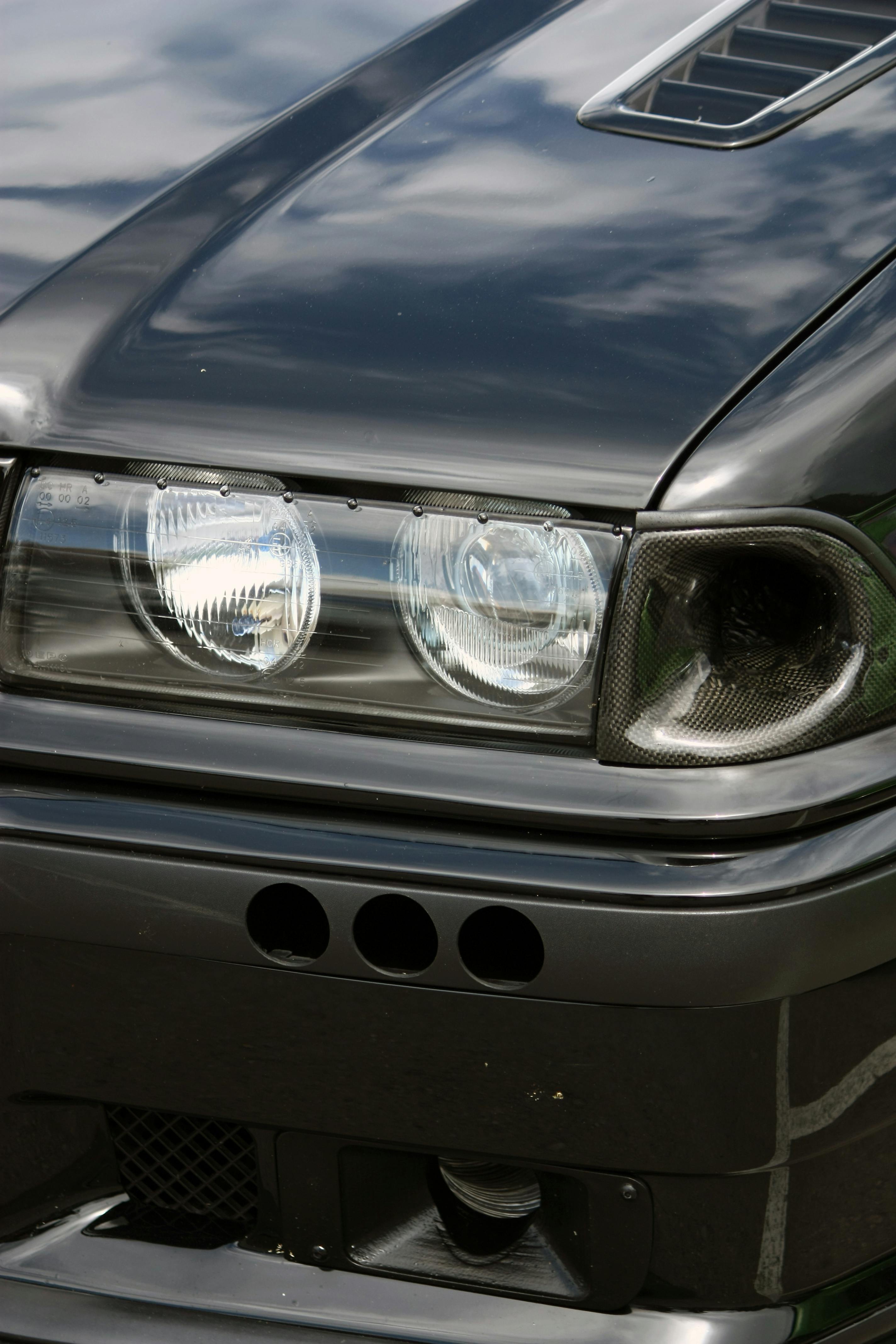Headlight of Black BMW Car · Free Stock