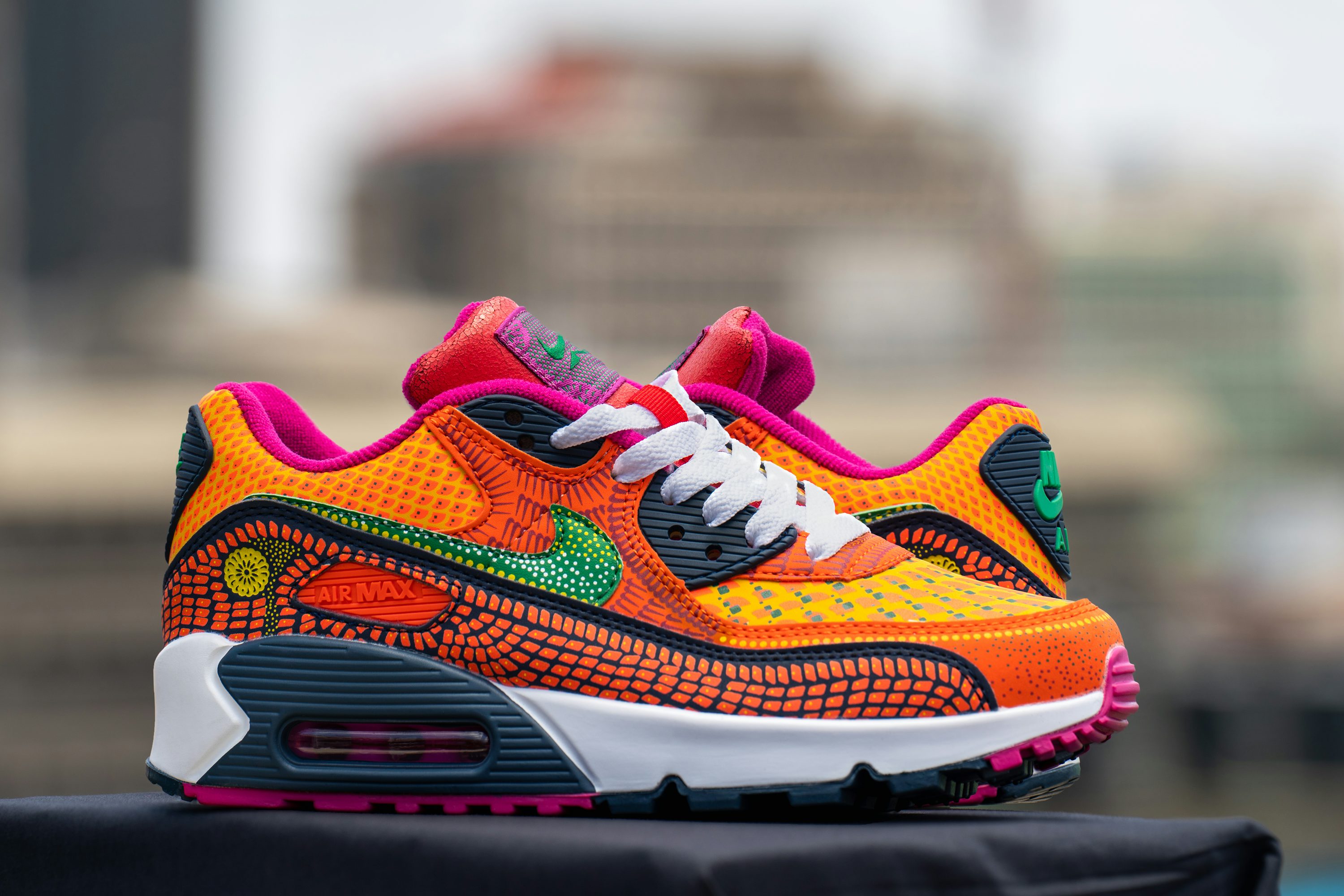 A close up of a colorful nike air max