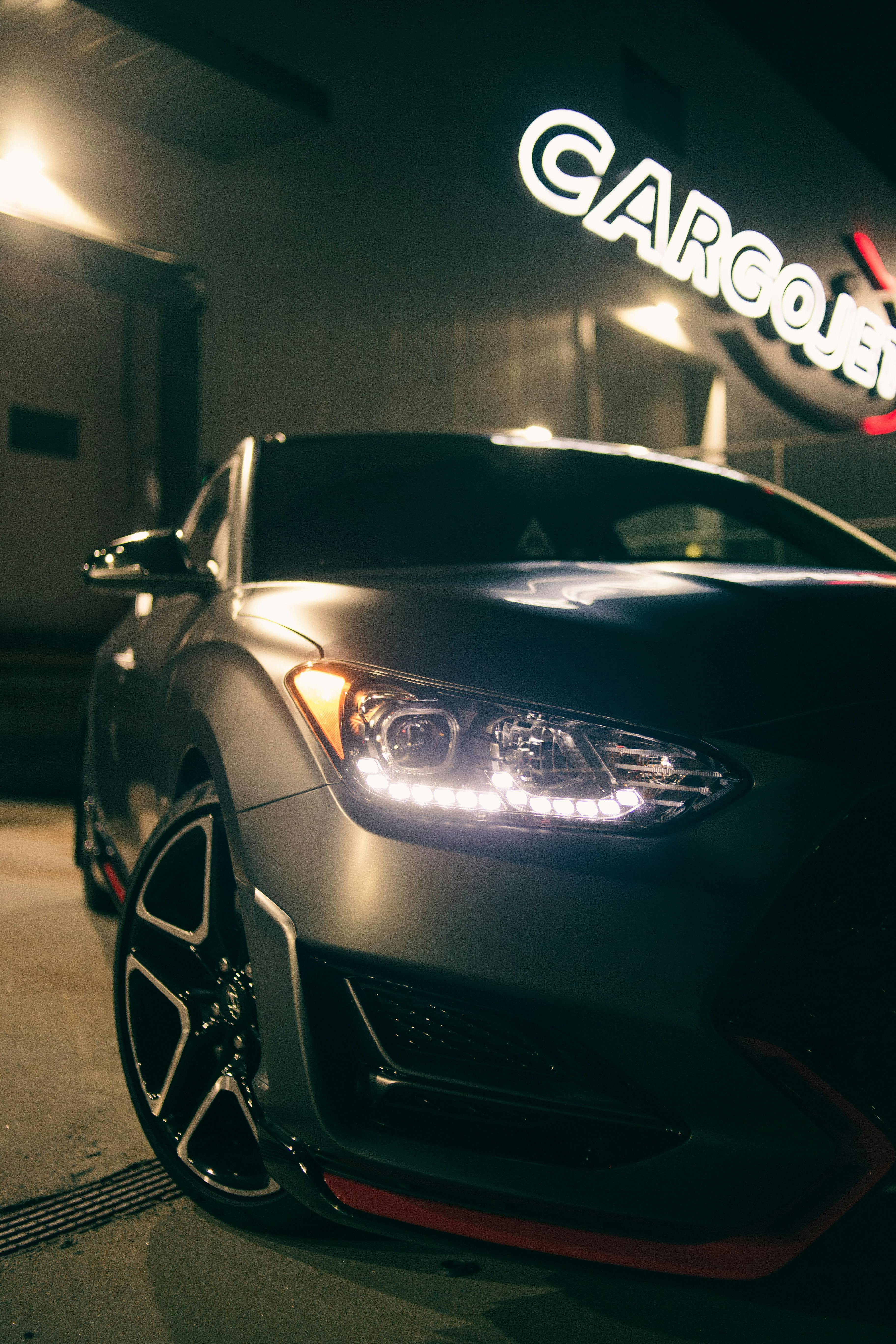 Car with Headlights on · Free