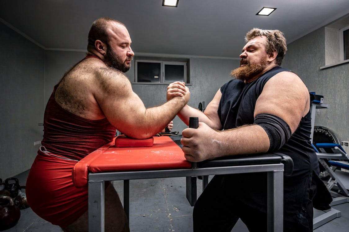 Arm Wrestling Between Big Men · Free