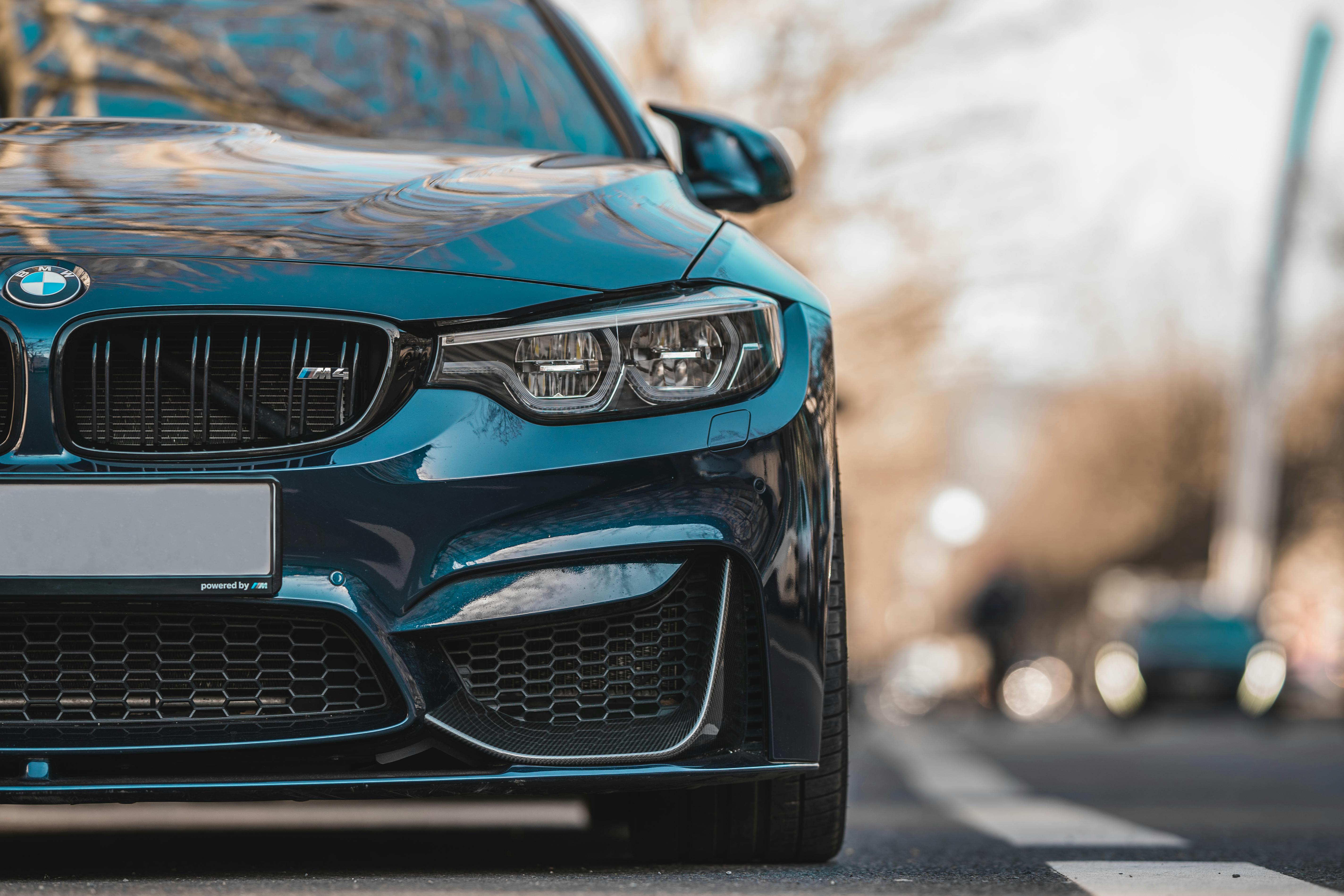 Blue Bmw Car on the Road · Free