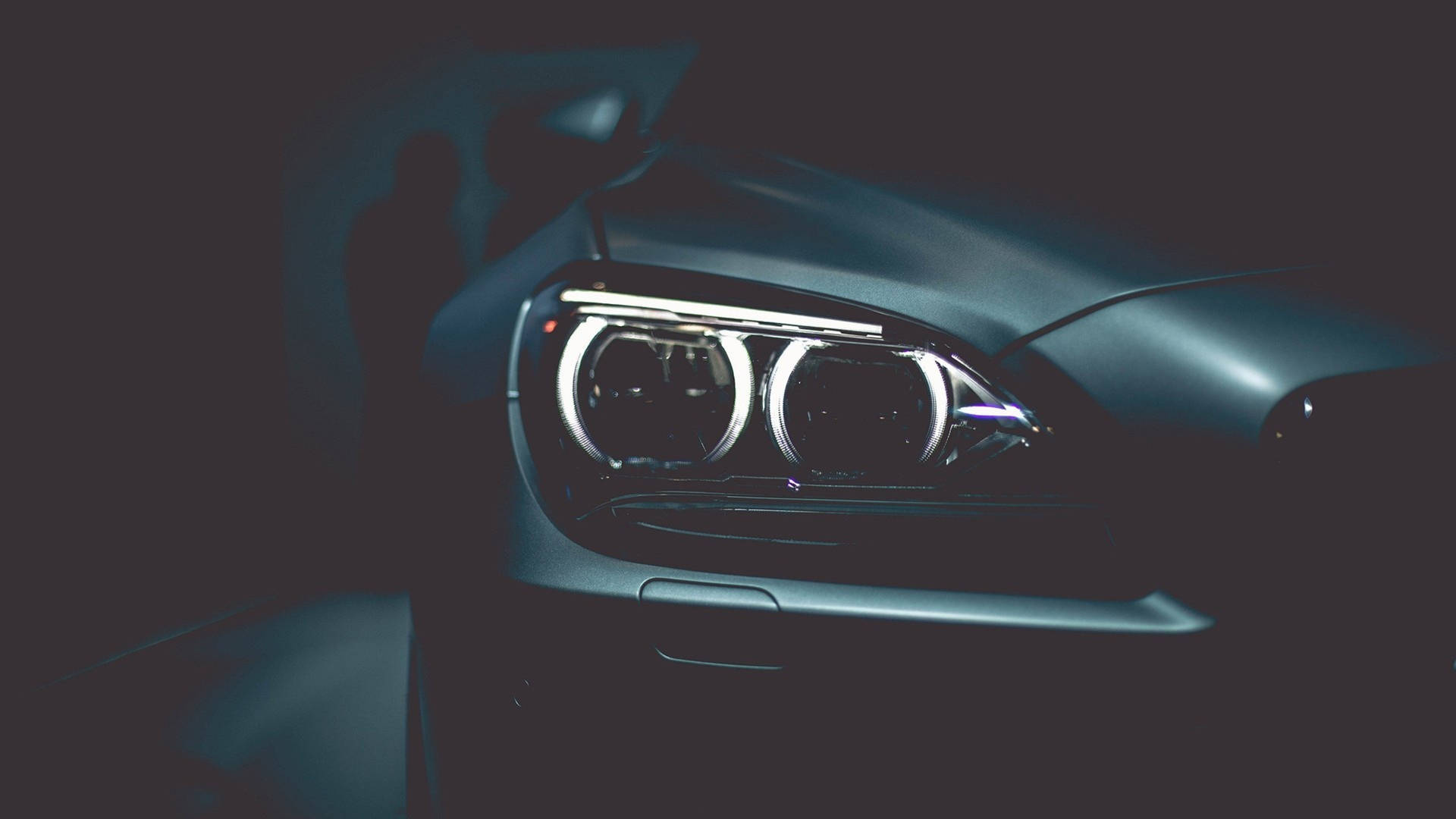 Download 4k Bmw Headlights Wallpaper