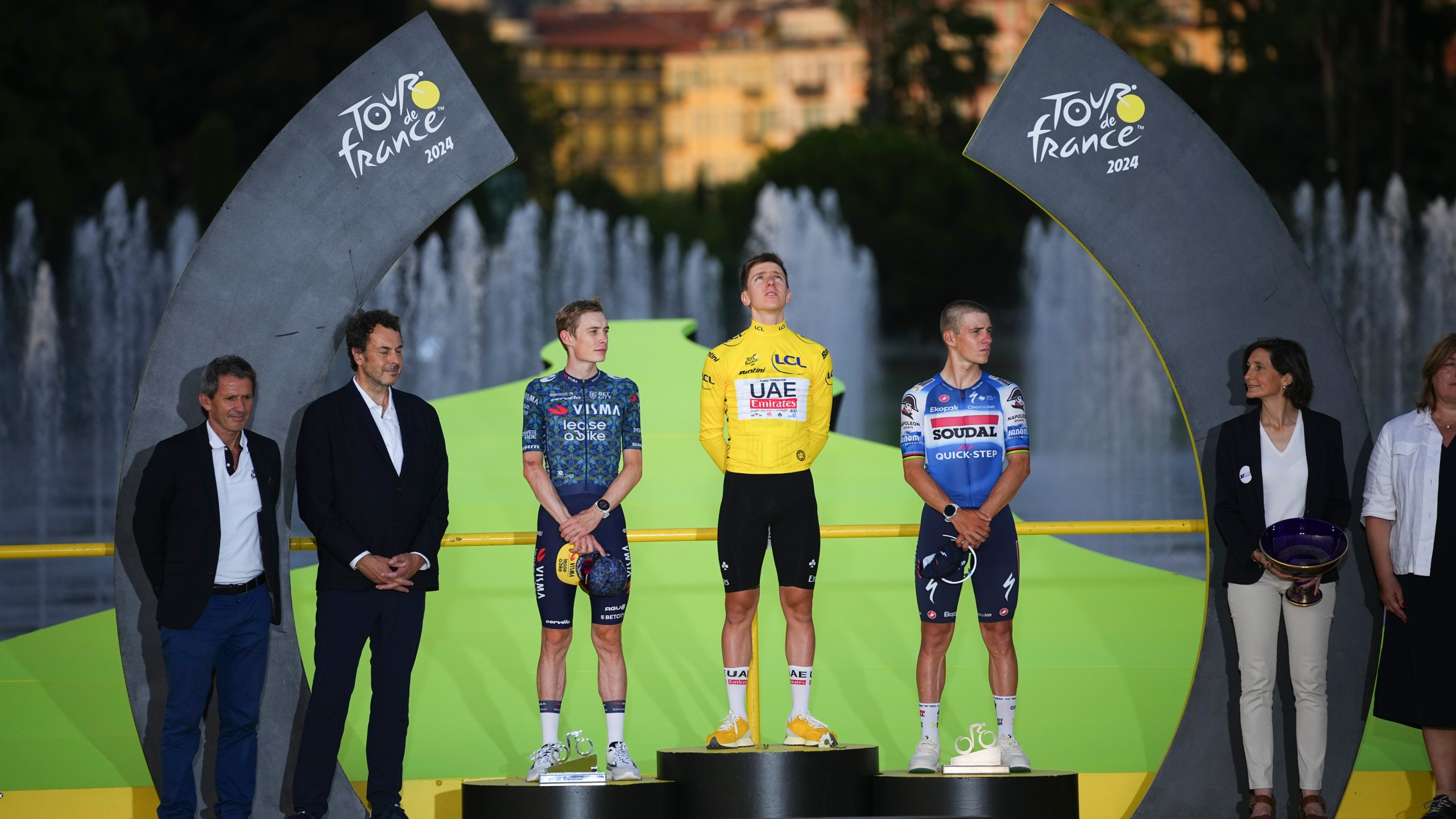 Tadej Pogacar celebrates his 3rd Tour
