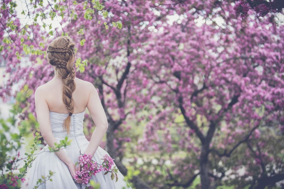 wedding dress amongst flowers