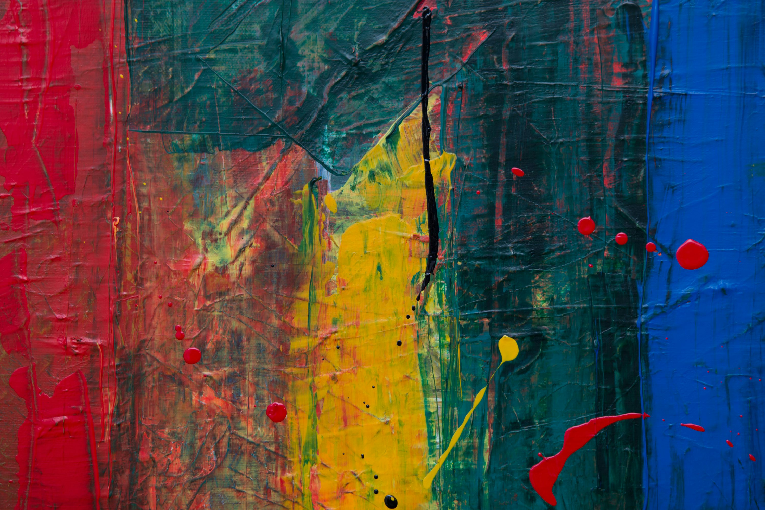 Yellow, red, and green abstract paintng