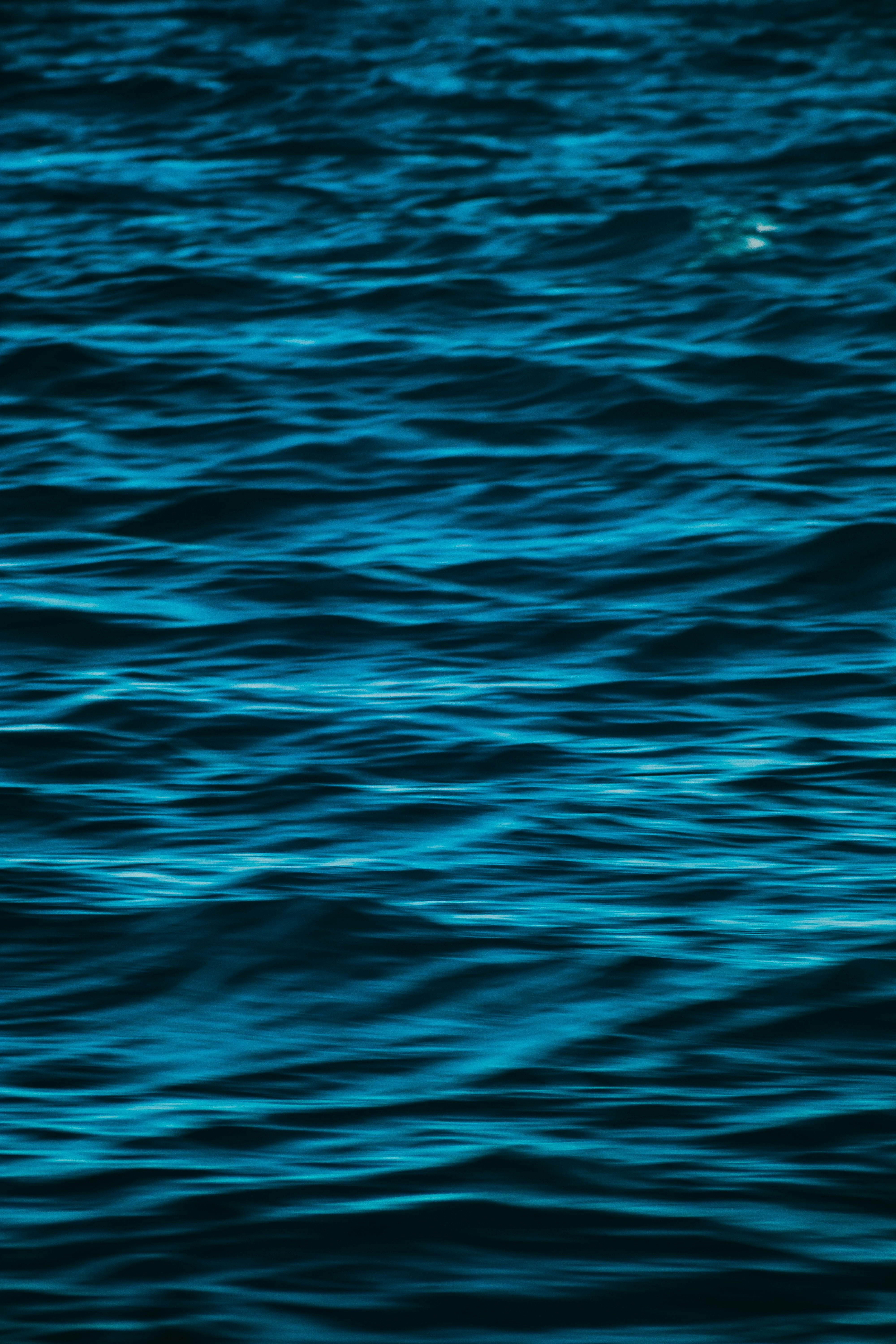 Photo of Blue Water Surface Waves