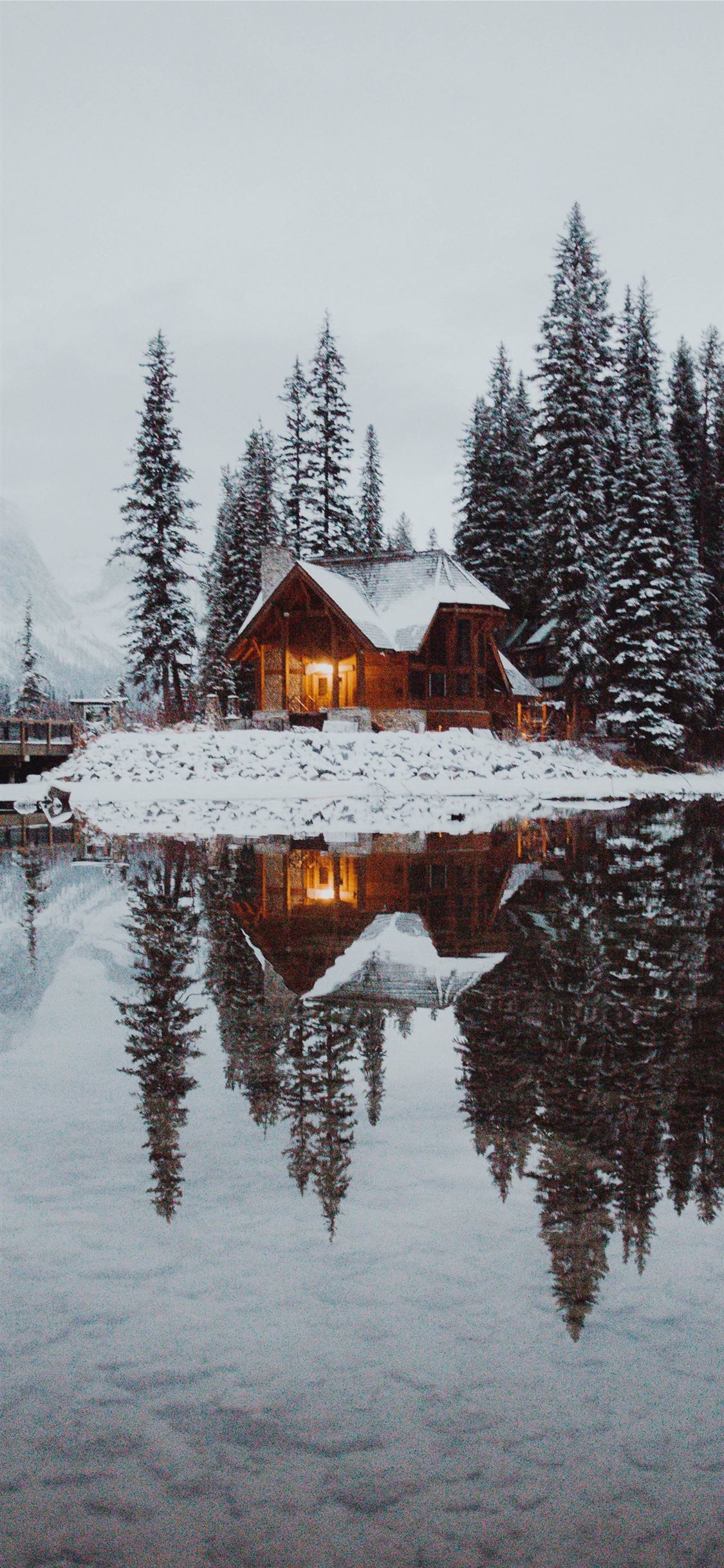 dock under gray sky iPhone Wallpaper