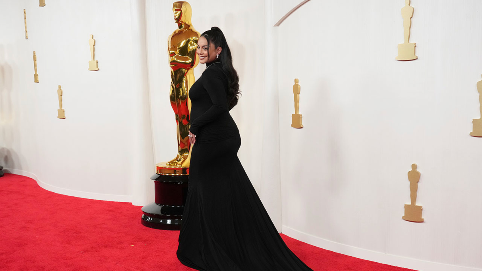 Pregnant Vanessa Hudgens shows off baby