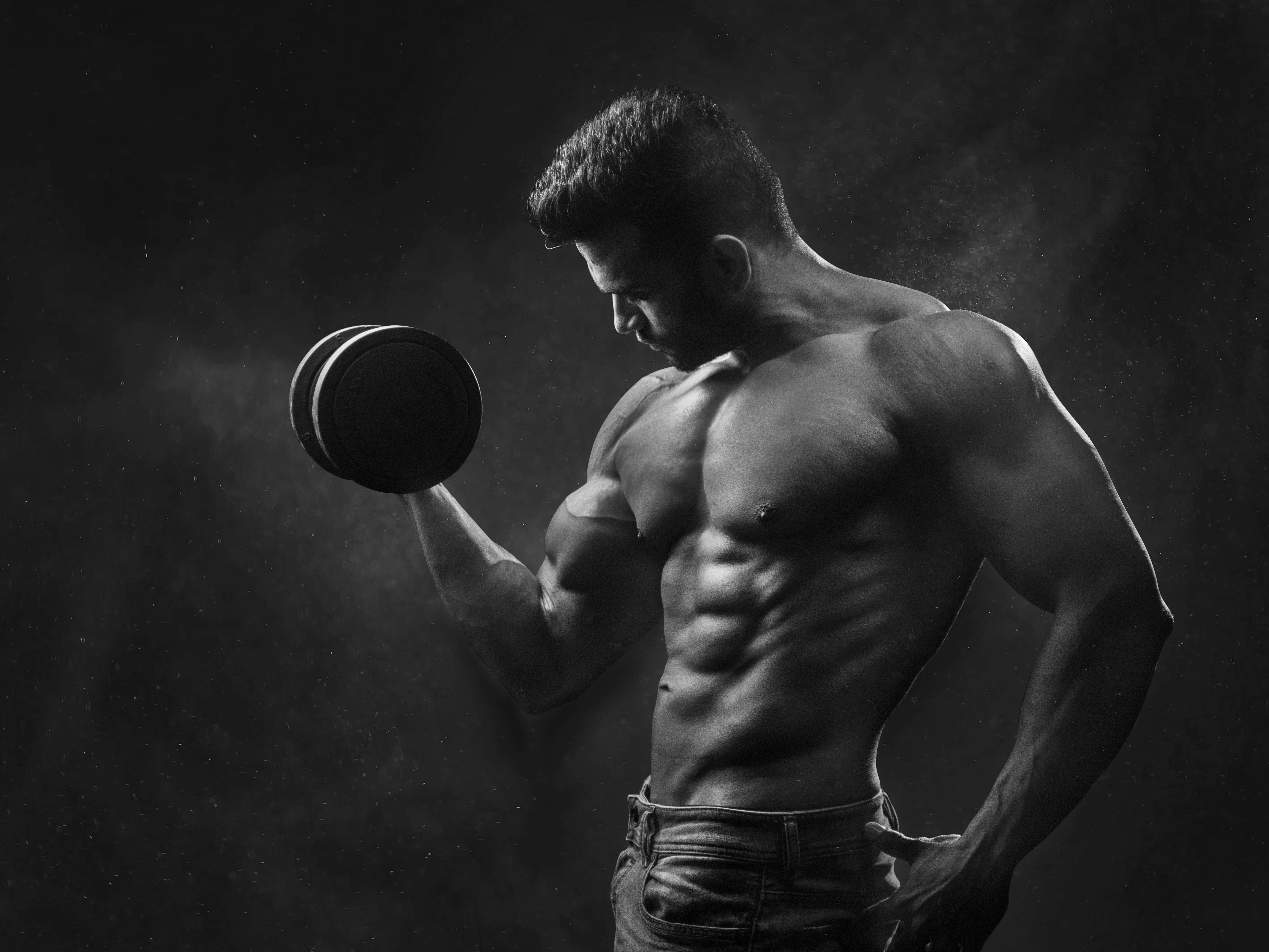 Man Holding Black Dumbbell · Free