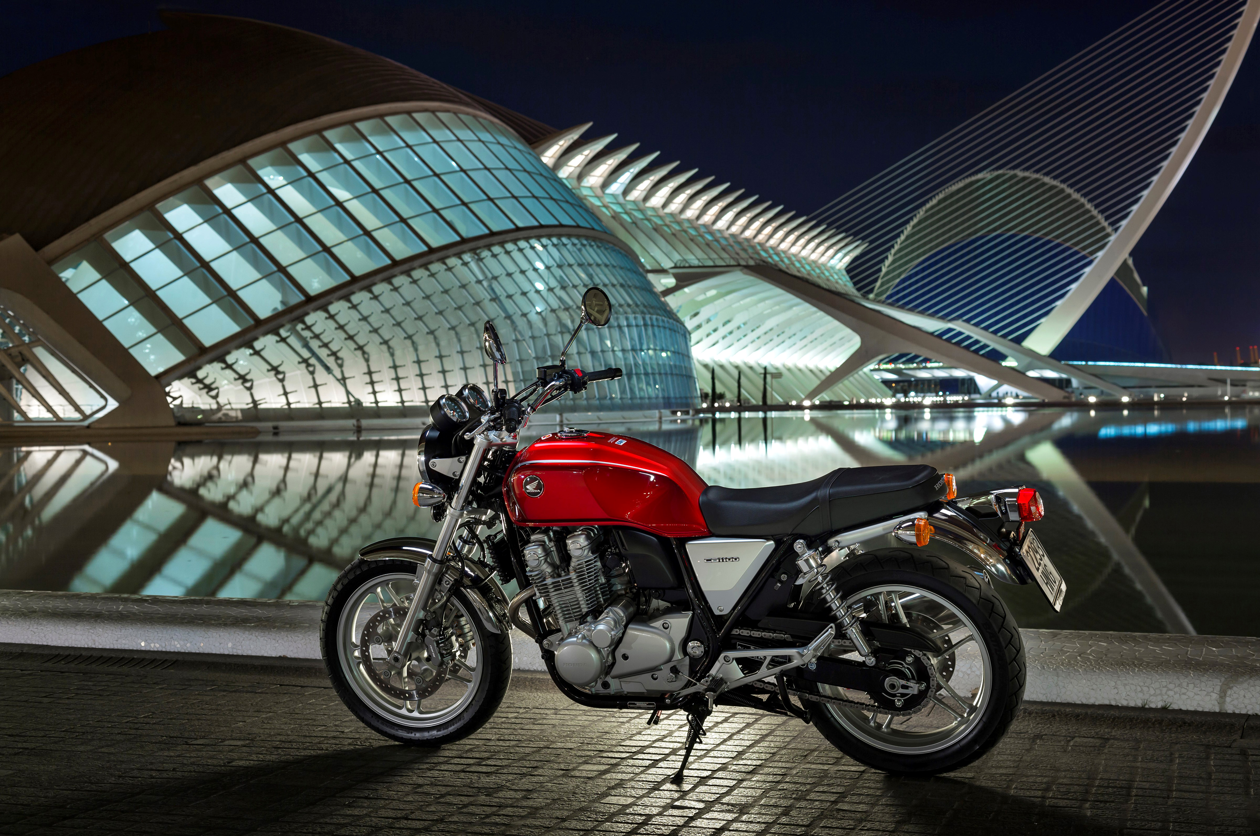 Night Reflections: Honda CB1100 at Futuristic Waterfront