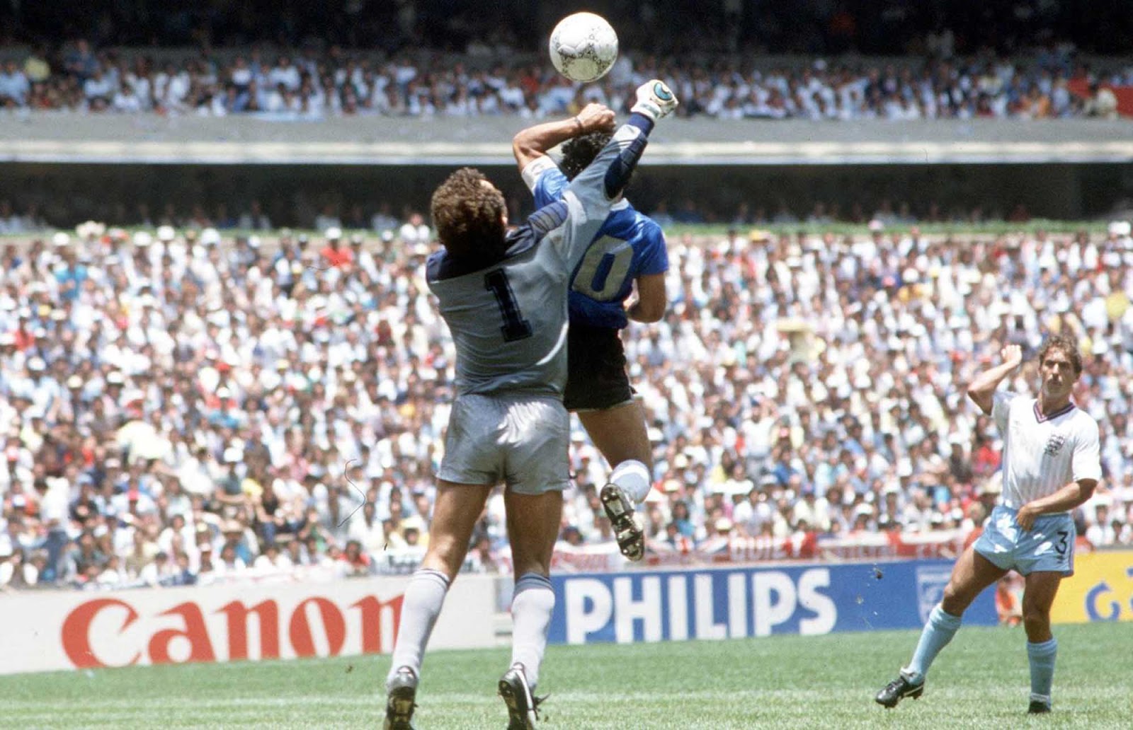 Diego Maradona scores the infamous Hand
