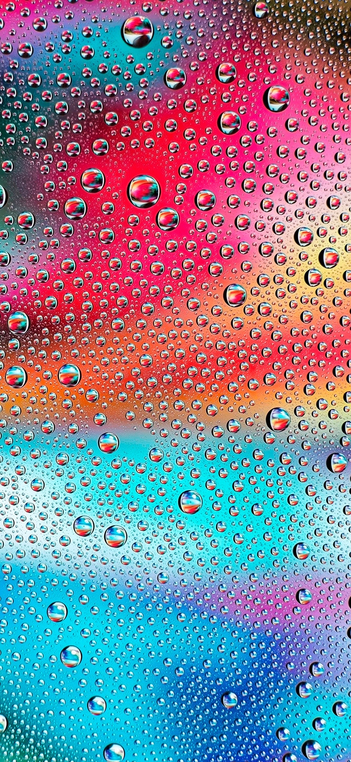 Cool Water Droplets On A Glass Surface
