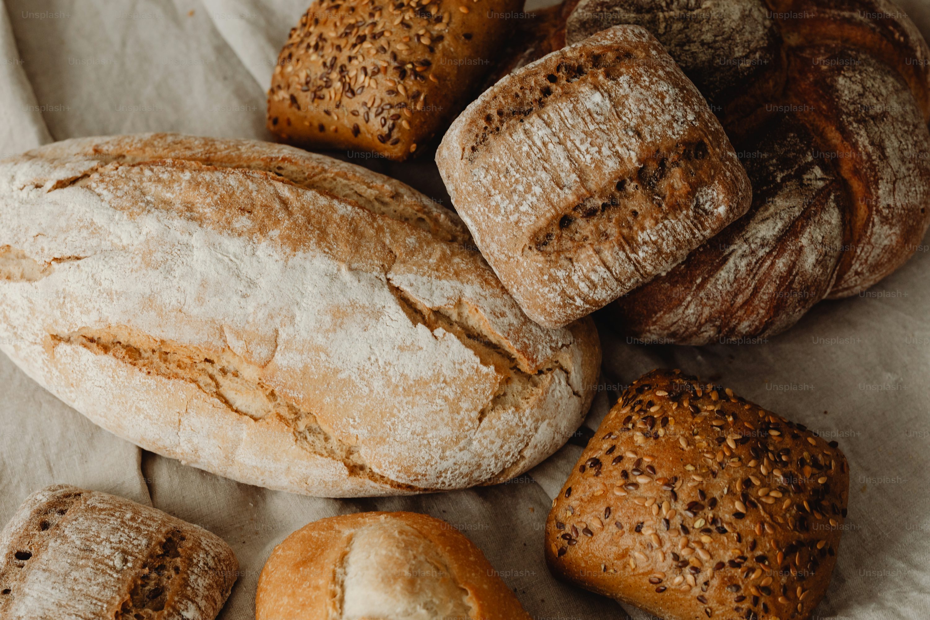 A bunch of loaves of bread sitting