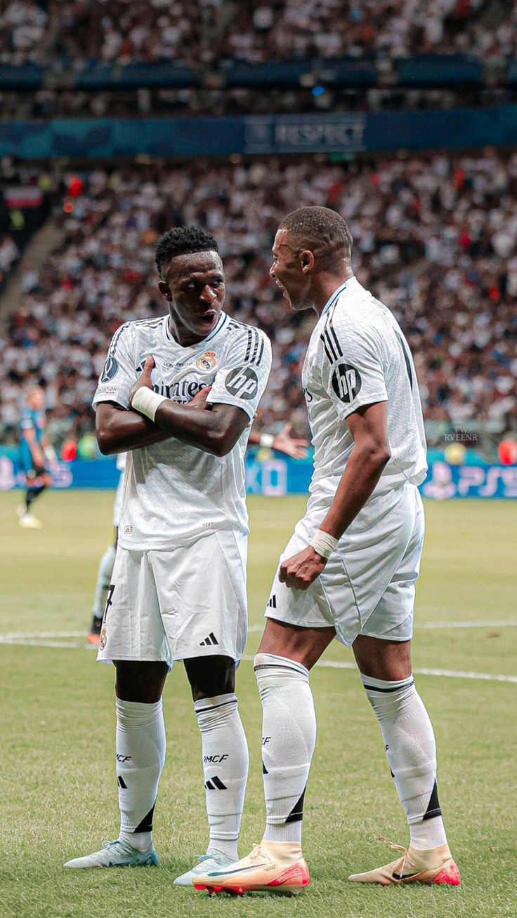 Kylian Mbappé and Vinicius Jr wallpaper