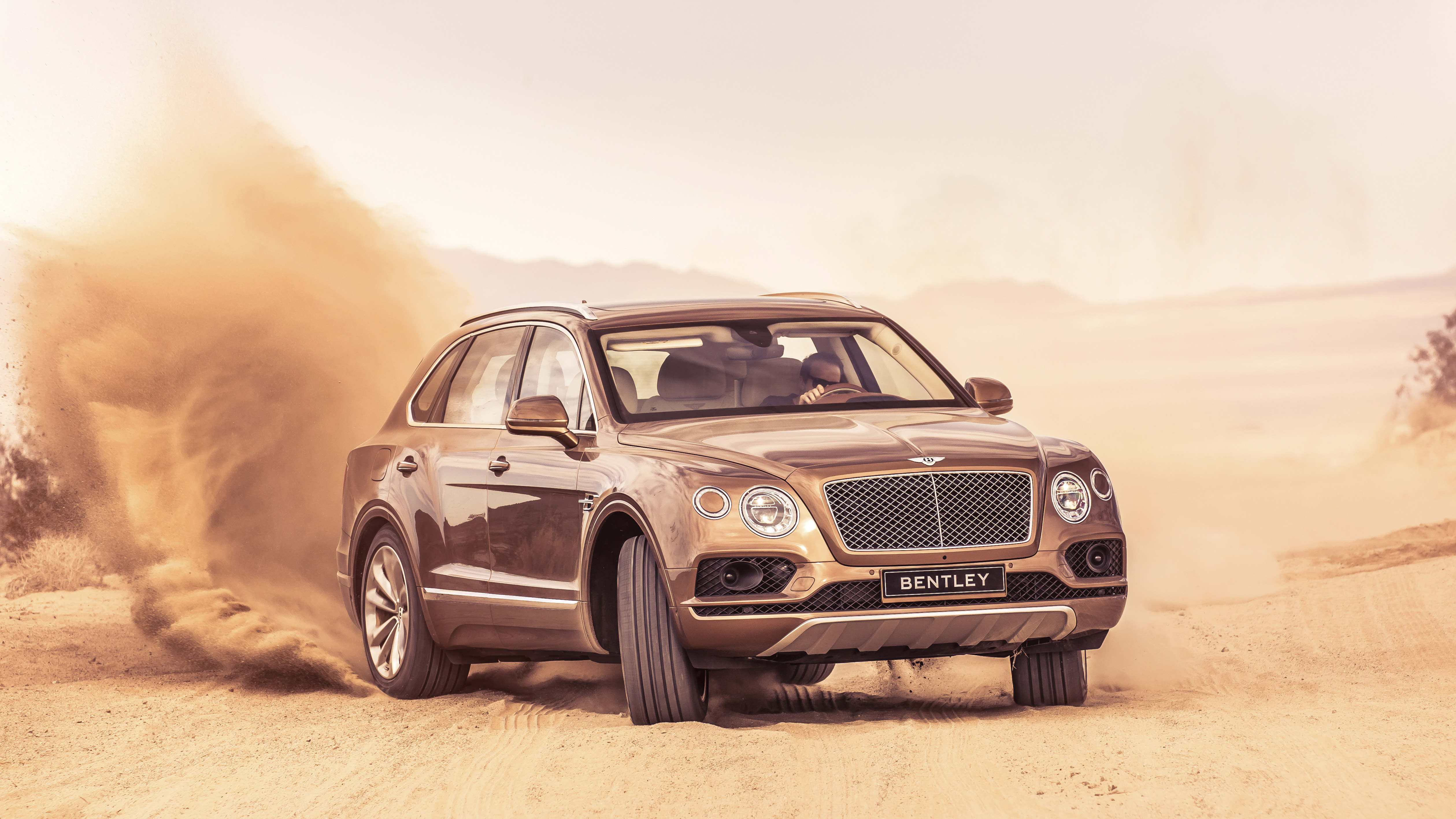 gold mining in a Bentley Bentayga