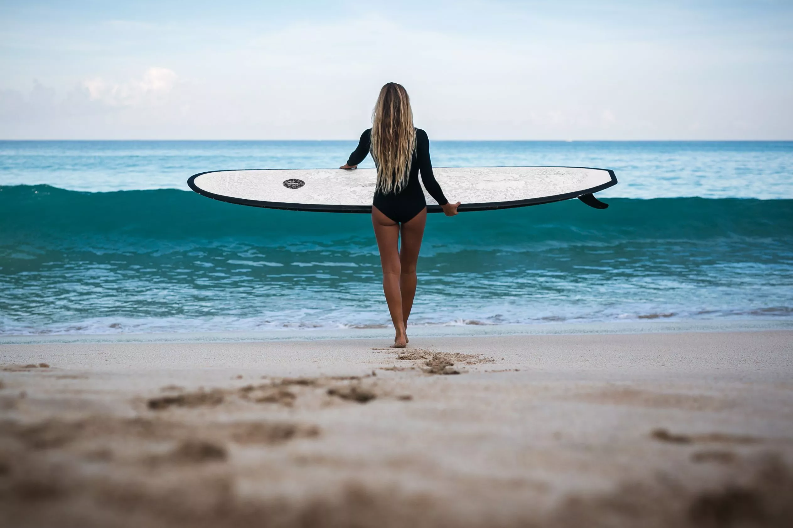 women surfing