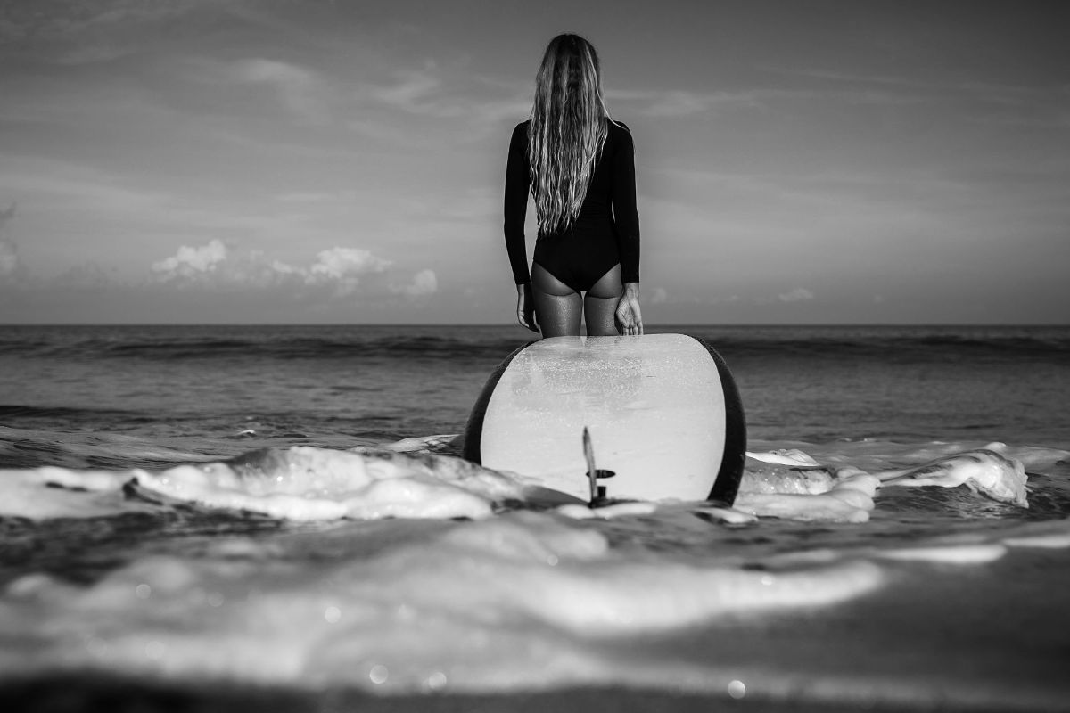 women surfing