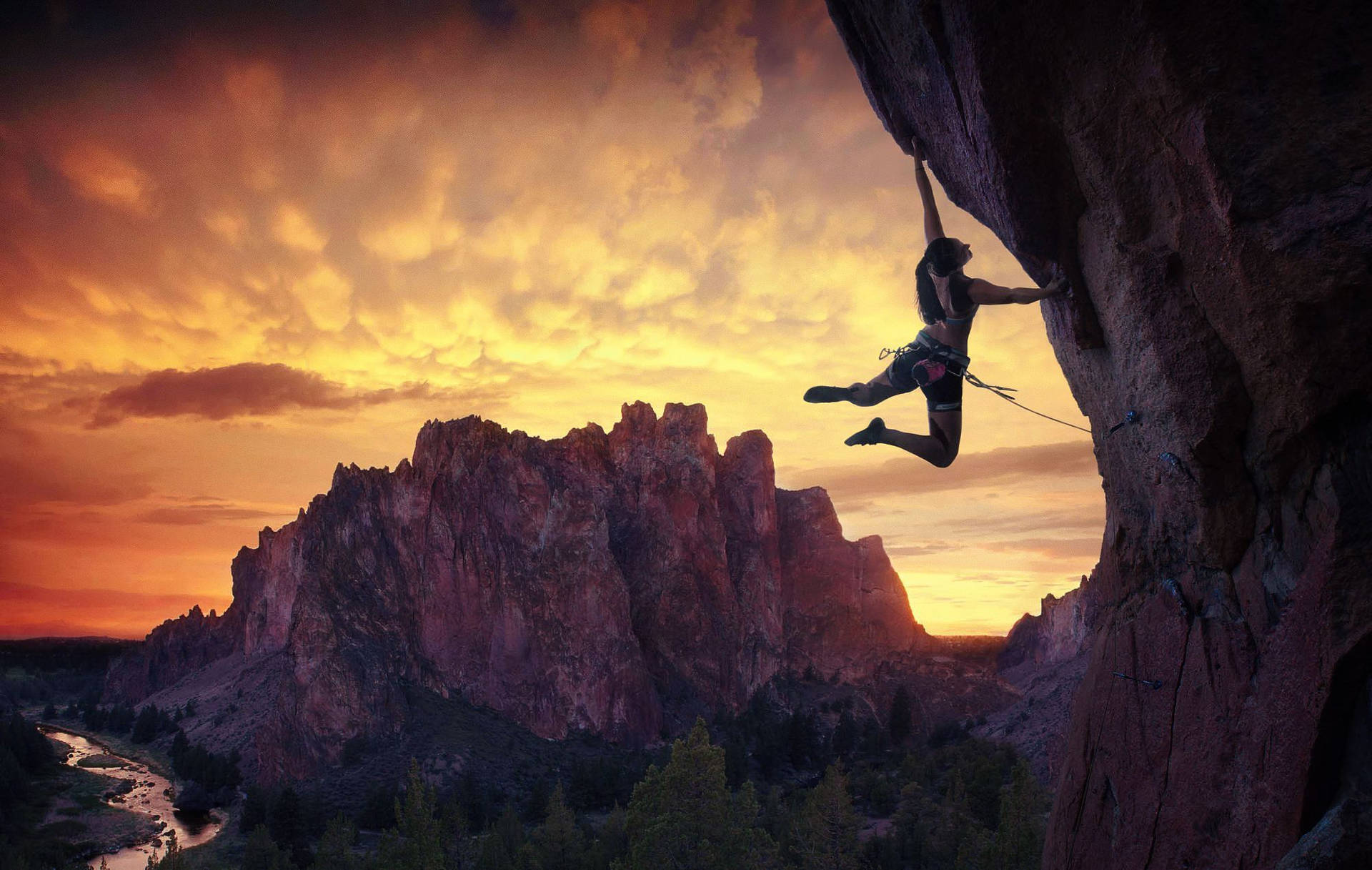 Climbing Female With Setting Sun