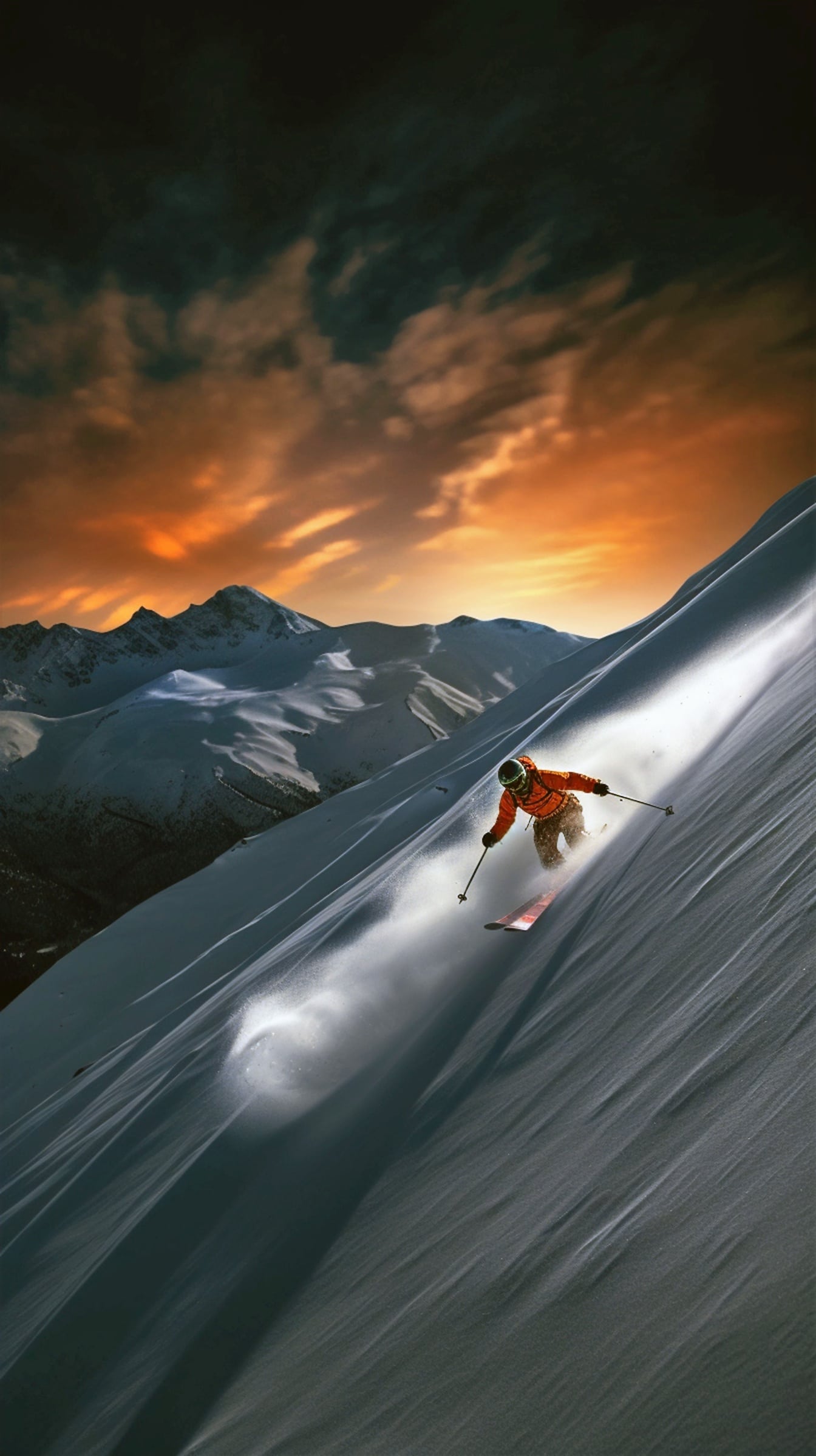 Extreme skier skiing on snowy slope