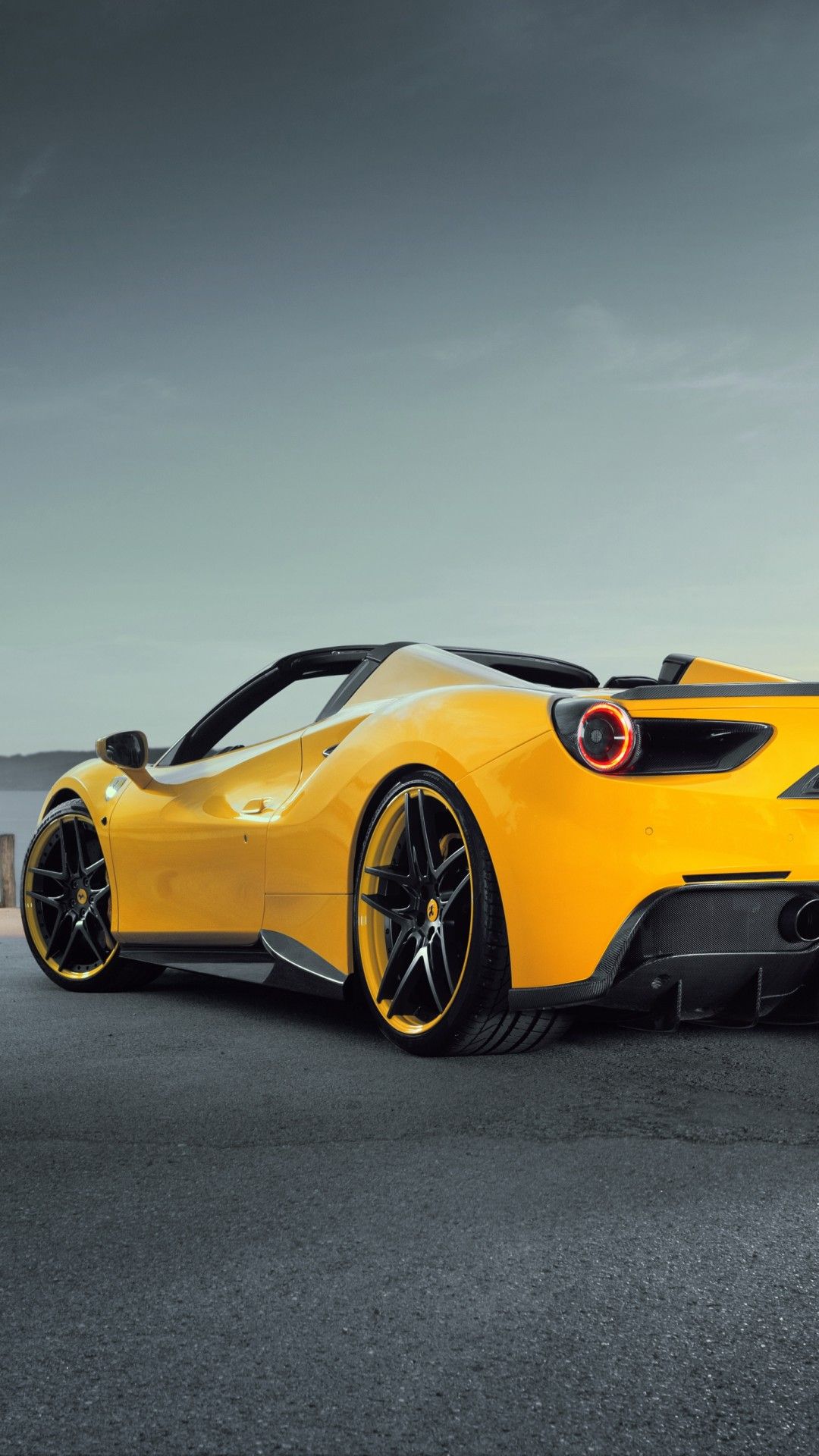 ferrari 488 spider, yellow, rear view