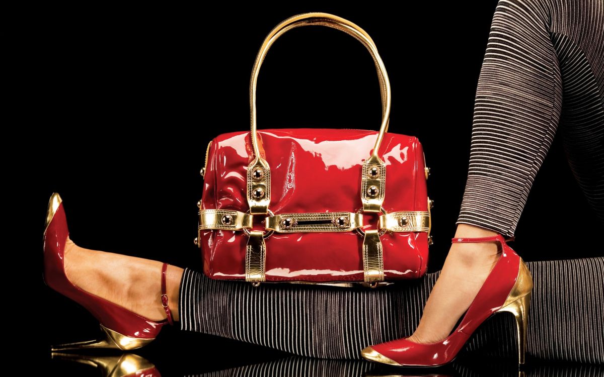 Wallpaper Red Leather Handbag on Black