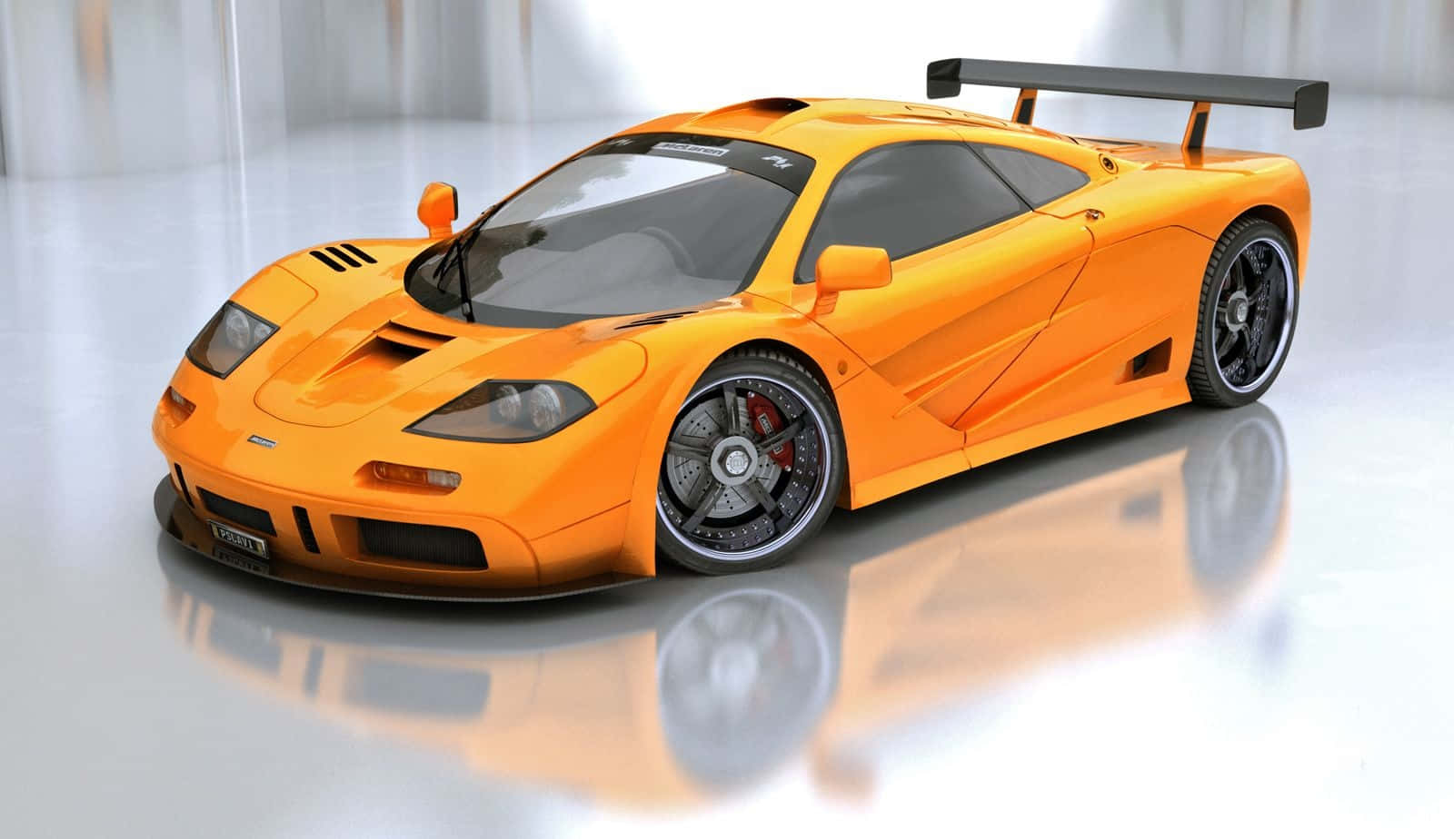 Download McLaren F1 racing on the track
