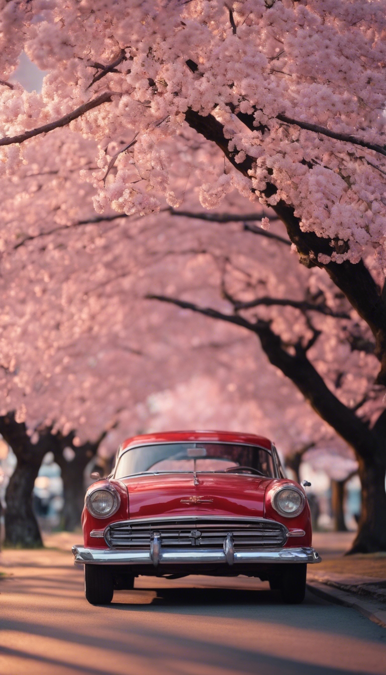 A pink and red vintage car parked