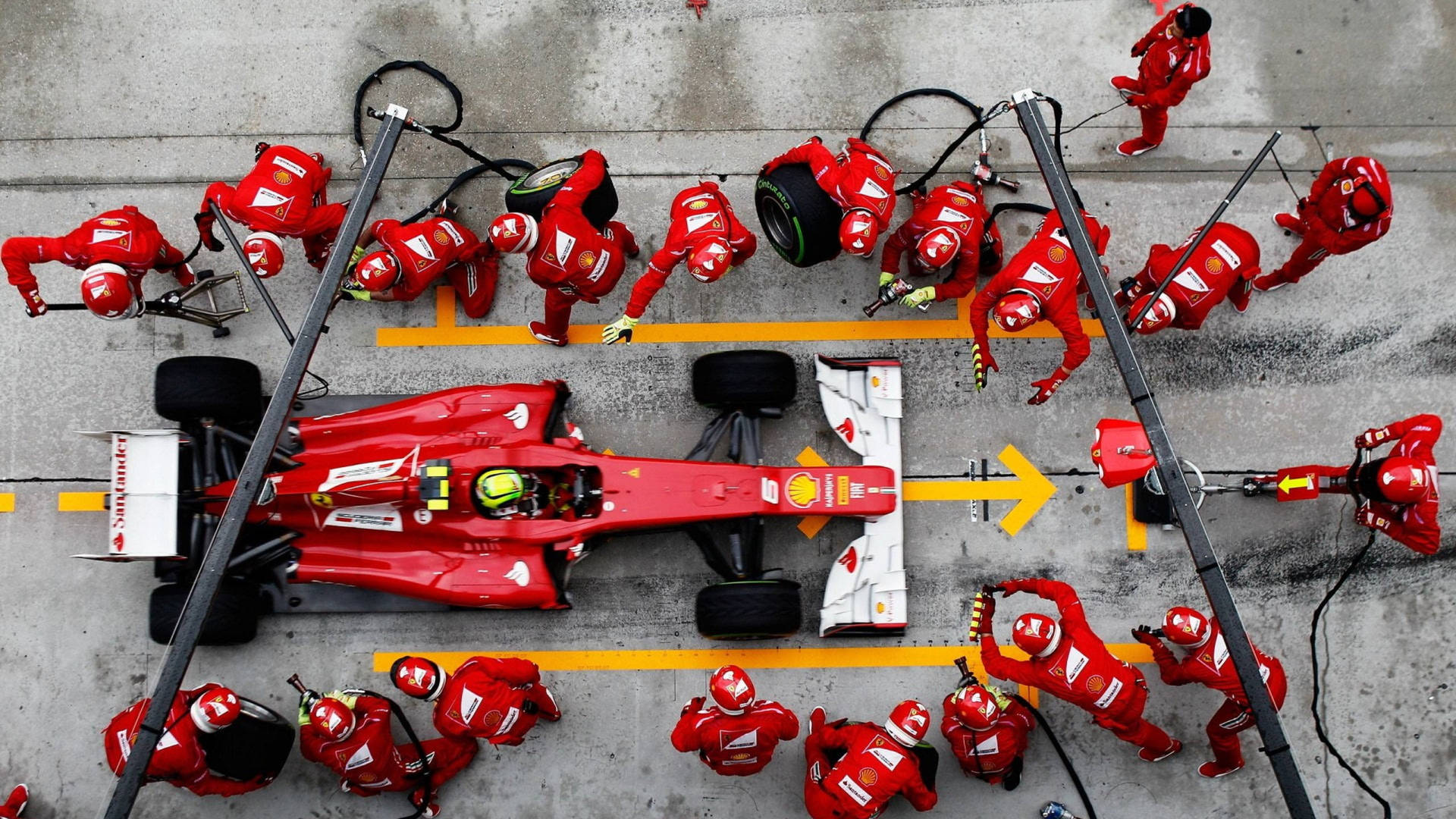 Red F1 Racing Car Pit Stop Wallpaper
