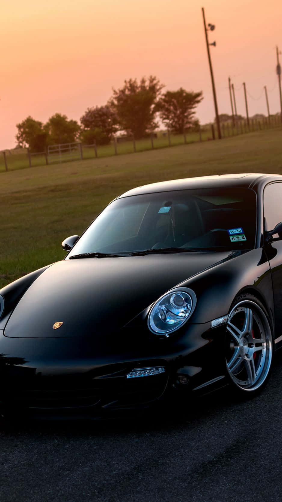 Download Caption: Sleek Porsche iPhone