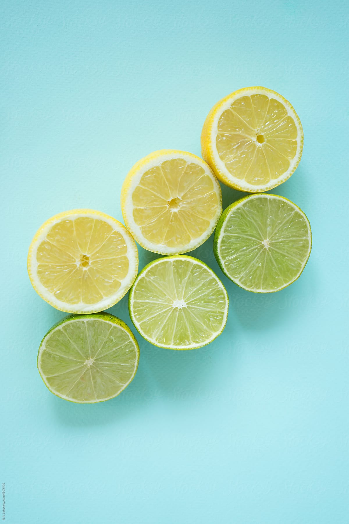 Limes On A Pastel Blue Background