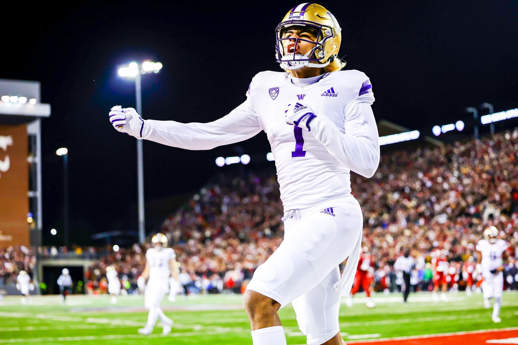 Huskies star WR Rome Odunze follows