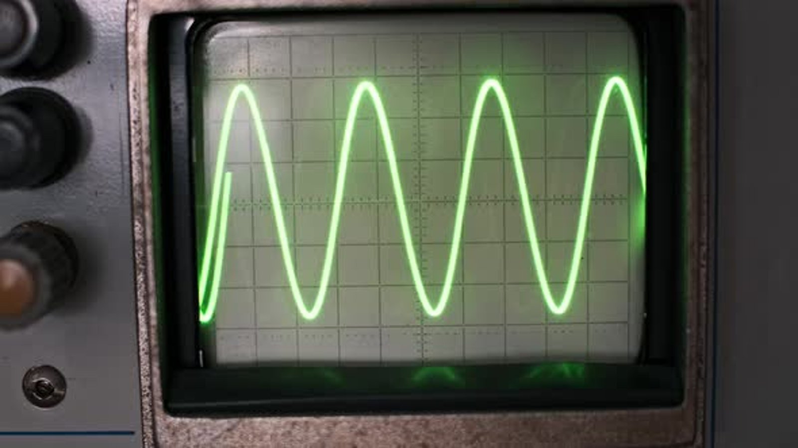 Vintage Oscilloscope Sine Wave Display