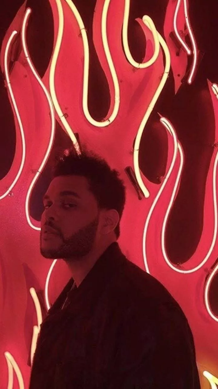 The Weeknd Posing In Red Flames