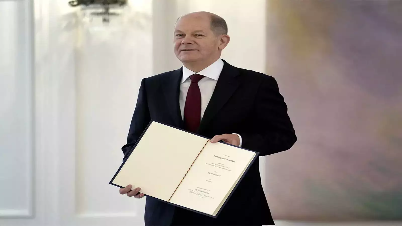 Olaf Scholz replaces Angela Merkel as