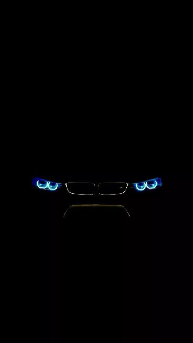 BMW M3 with Blue Headlights in the Dark