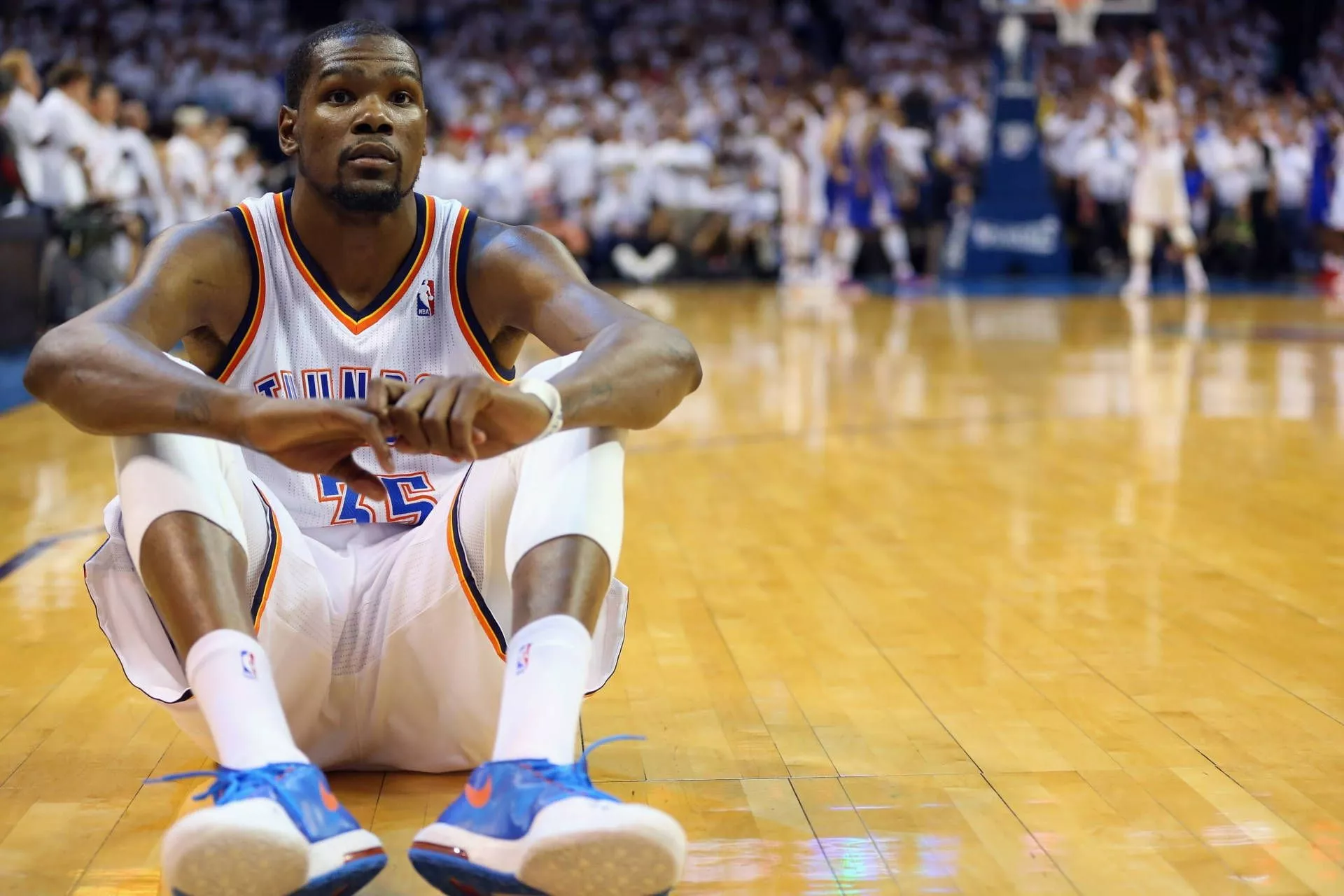 Kevin Durant Sitting On Basketball