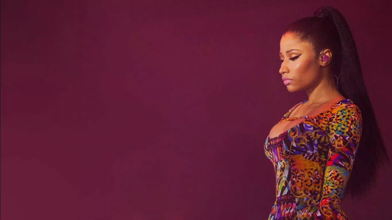 Nicki Minaj Is Standing In Purple Wall