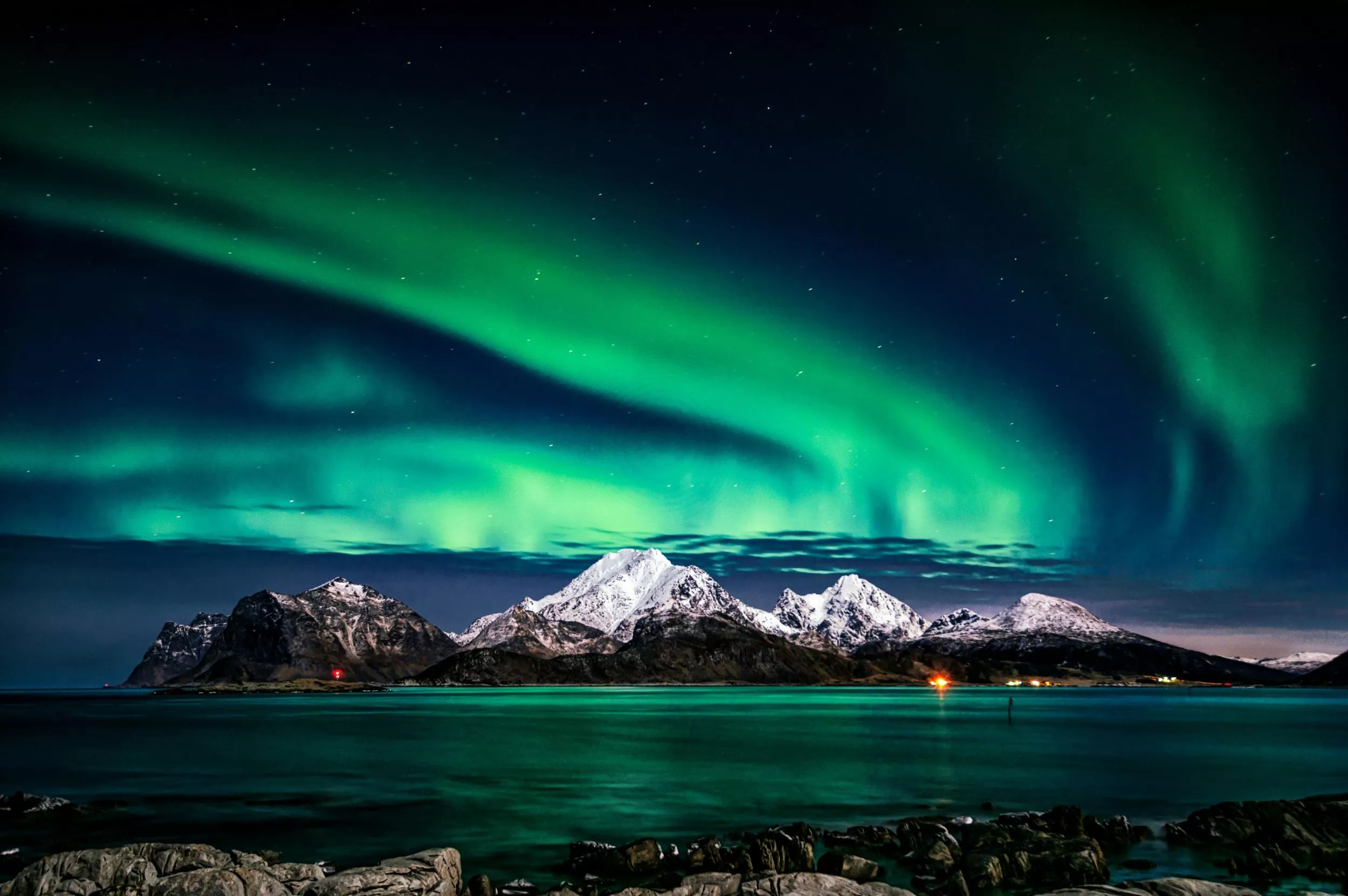 Vibrant Aurora Borealis Over Snowcapped