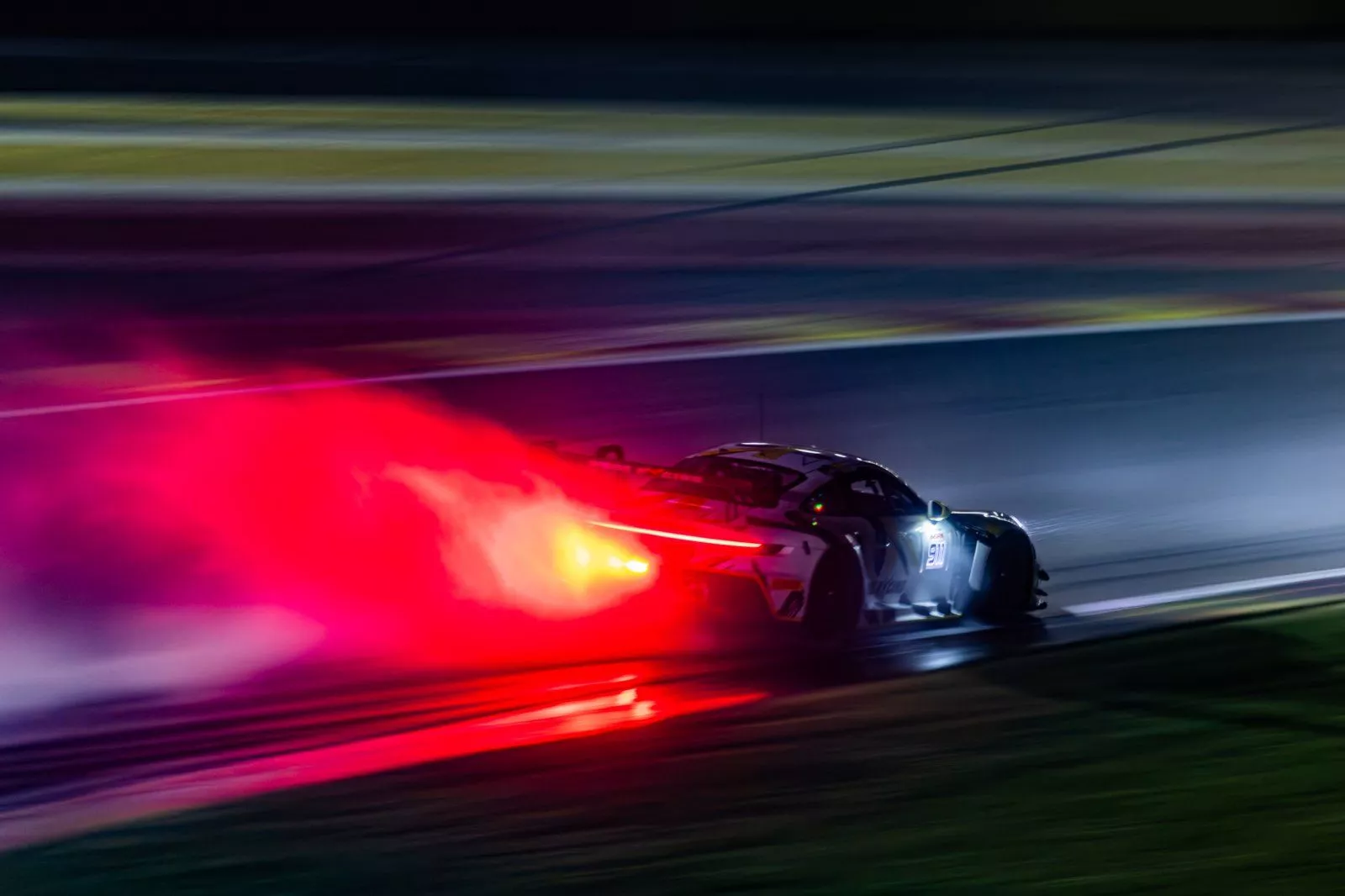 Pure Rxcing Porsche tops dramatic, rain