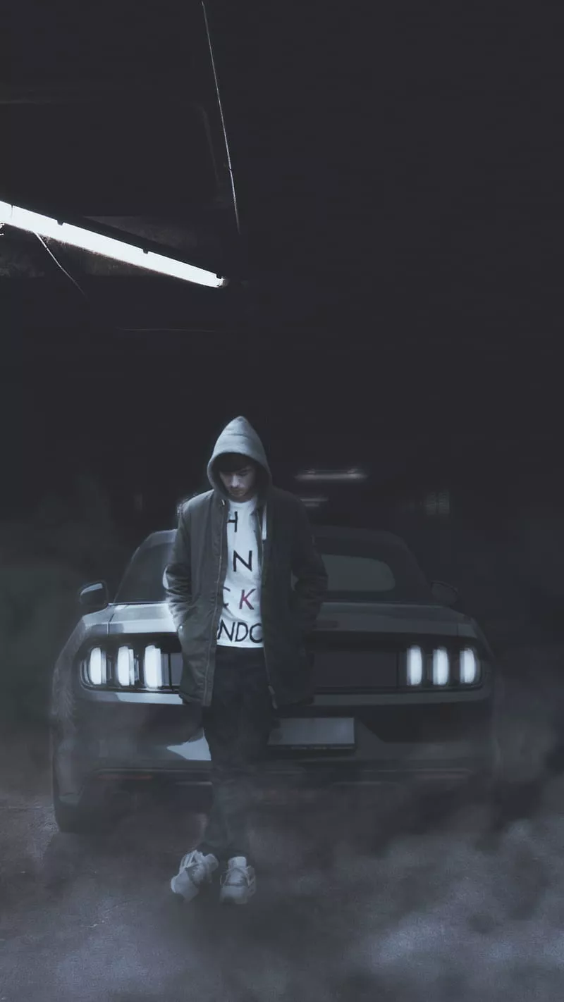Man with car, smoke, attitude, hoodie