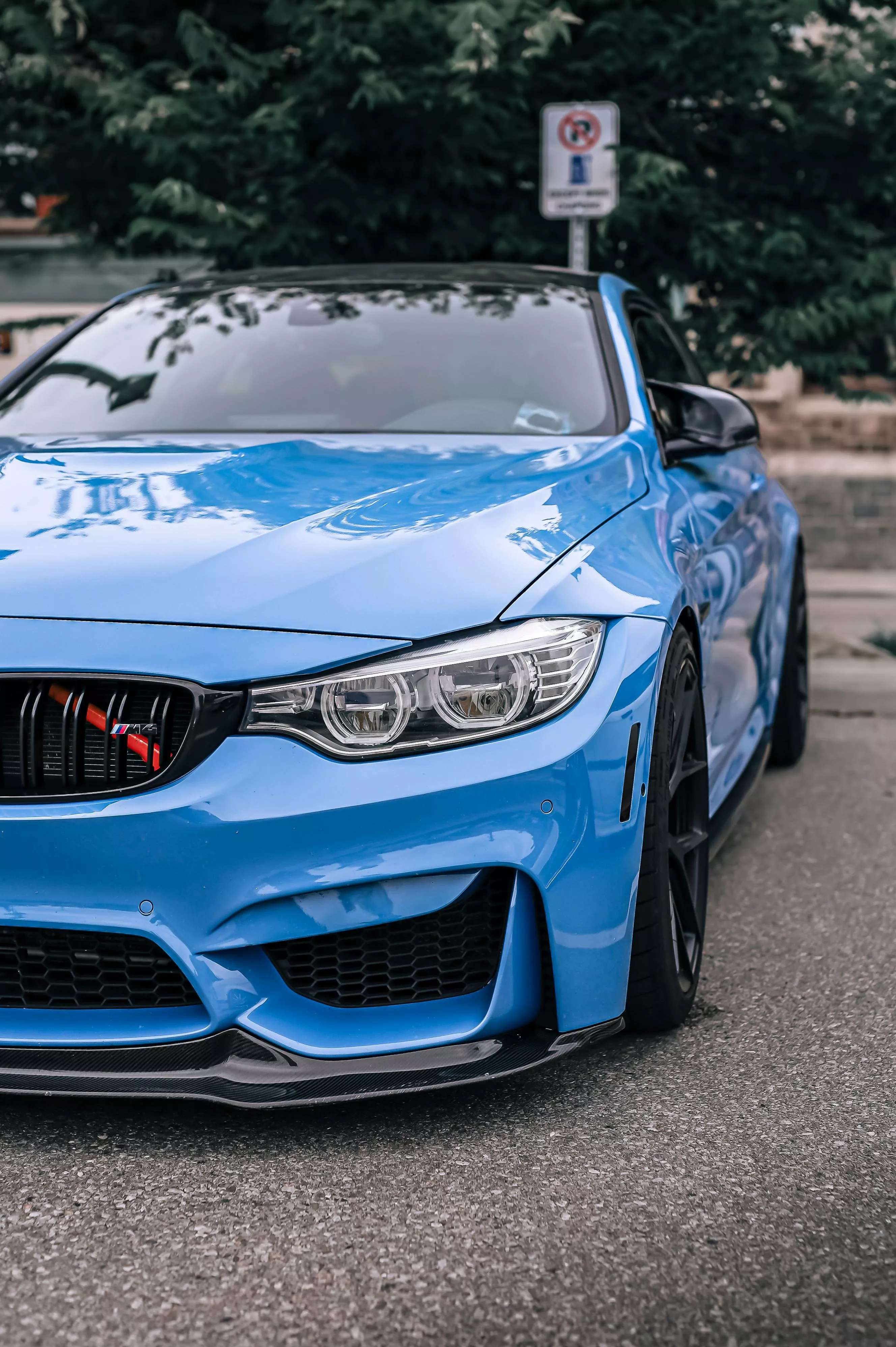 A Blue BMW M4 on the Parking Lot · Free